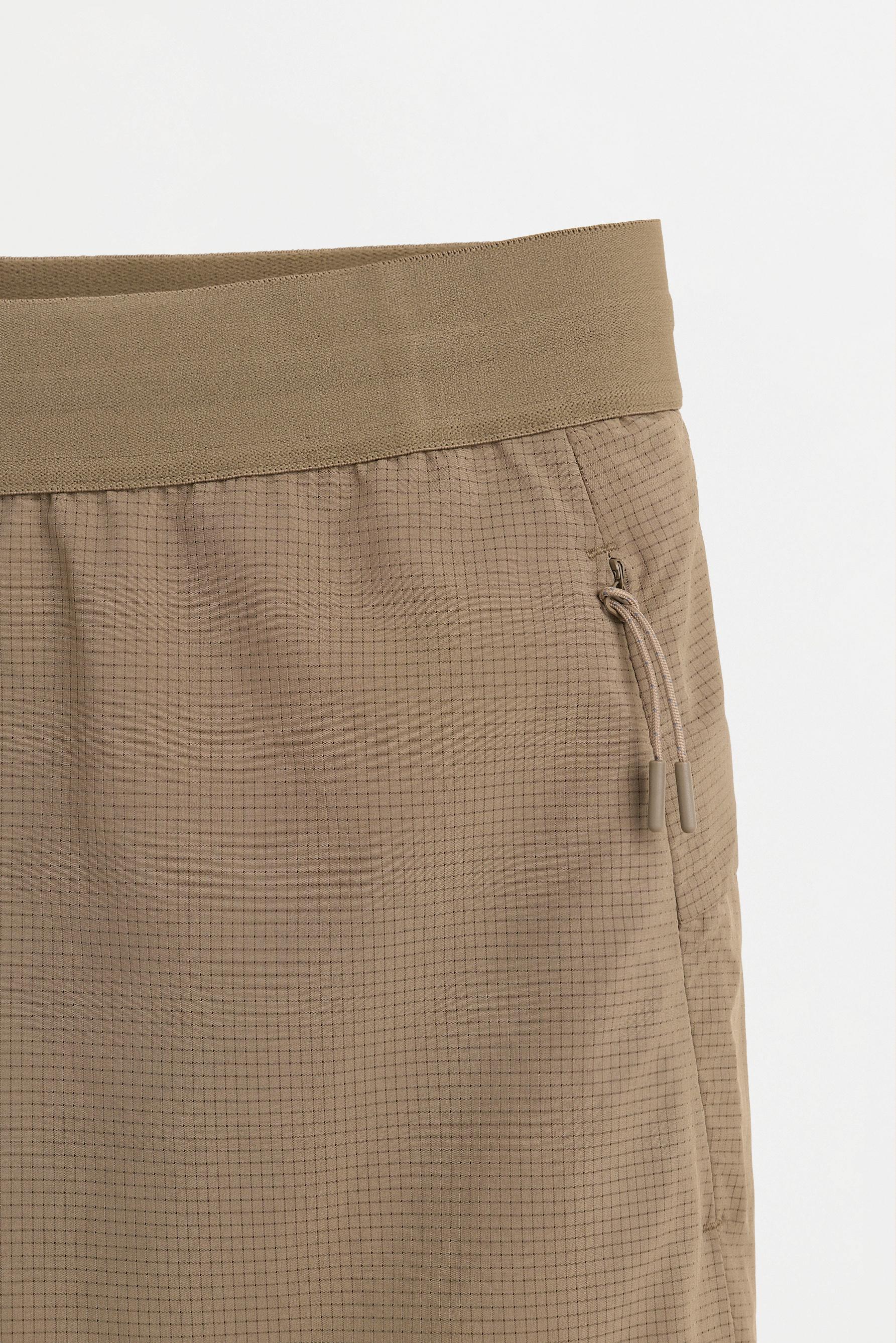 Bermuda sports shorts — MINK