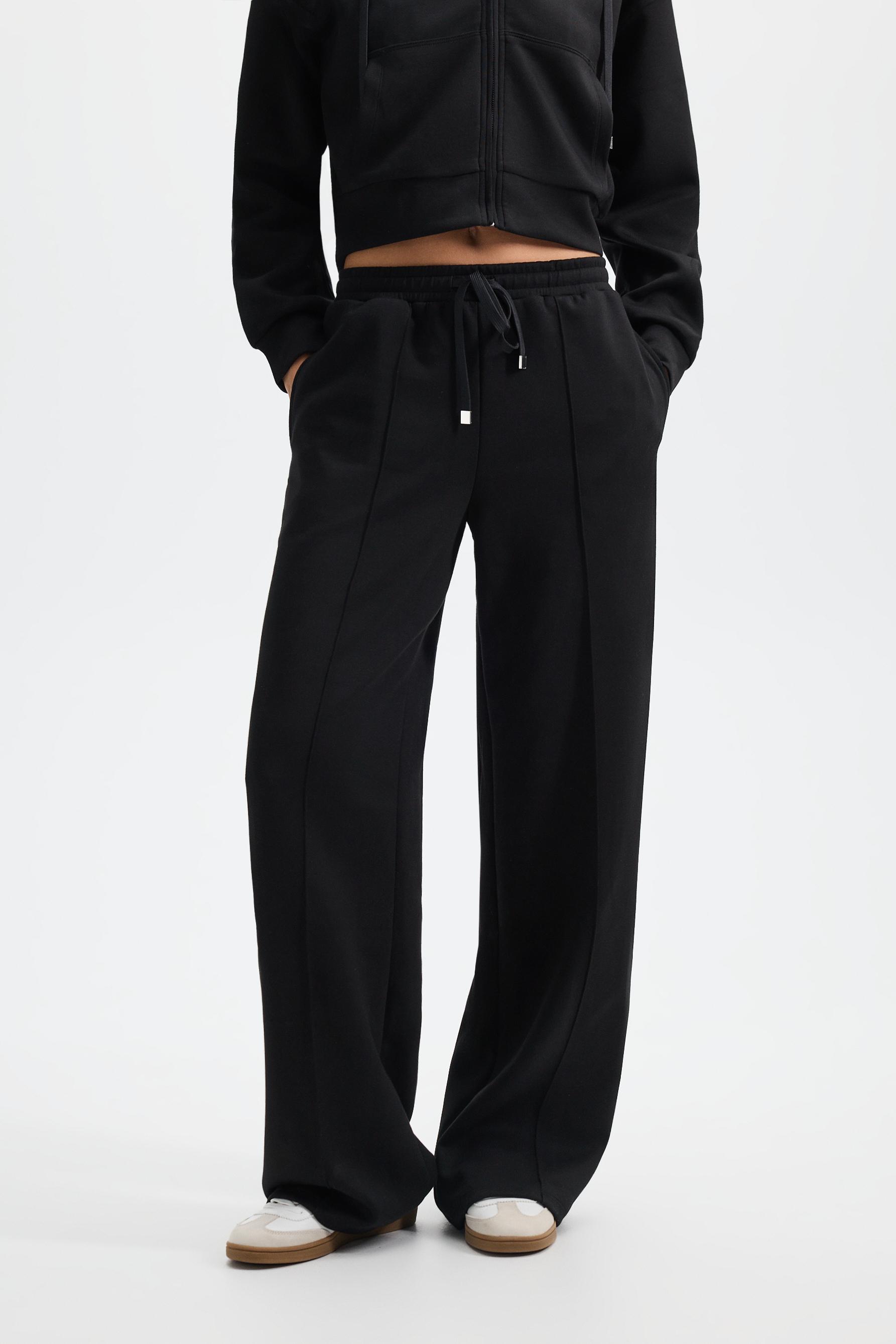 Wide-leg tracksuit trousers with front seam — BLACK