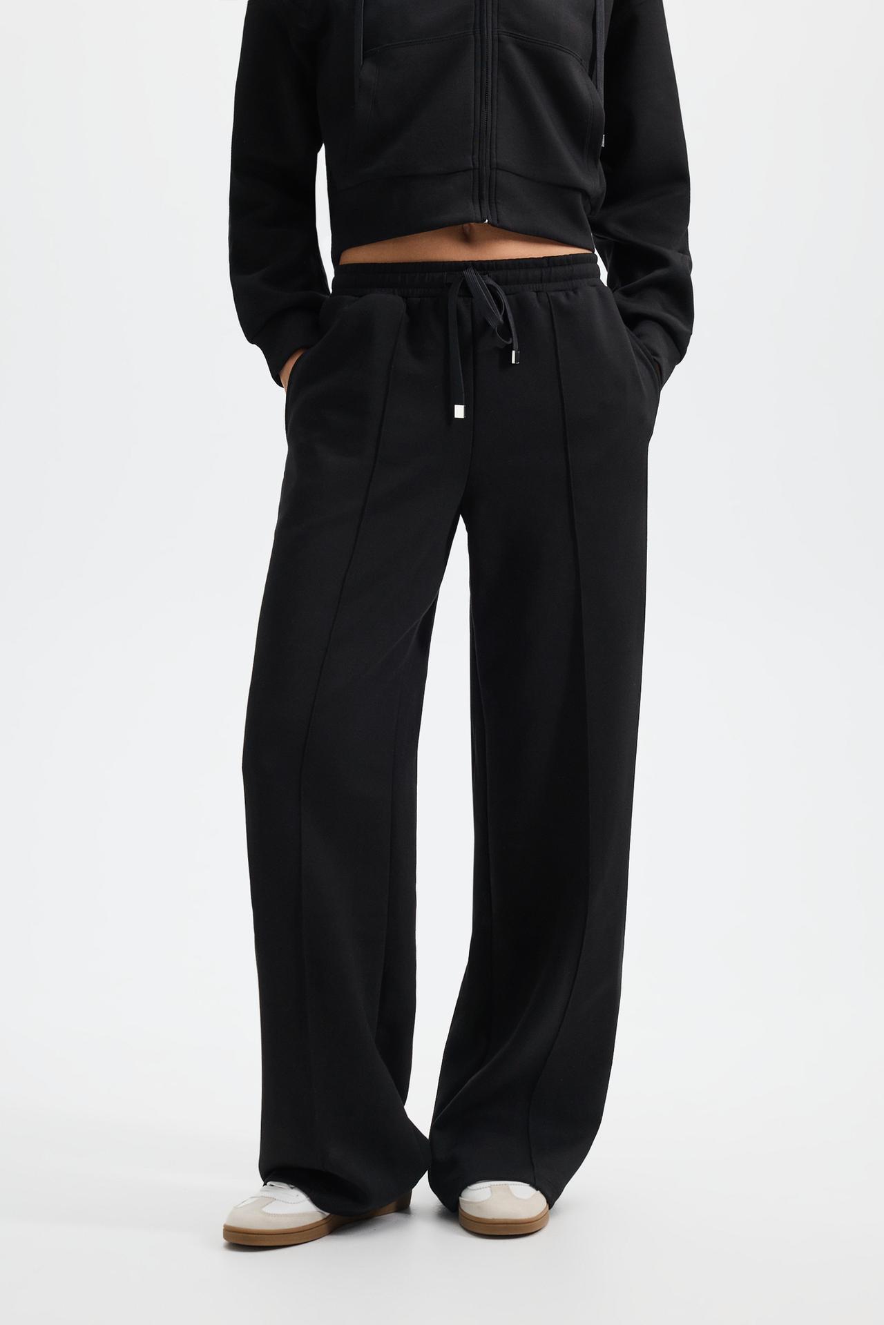 Wide-leg tracksuit trousers with front seam — BLACK