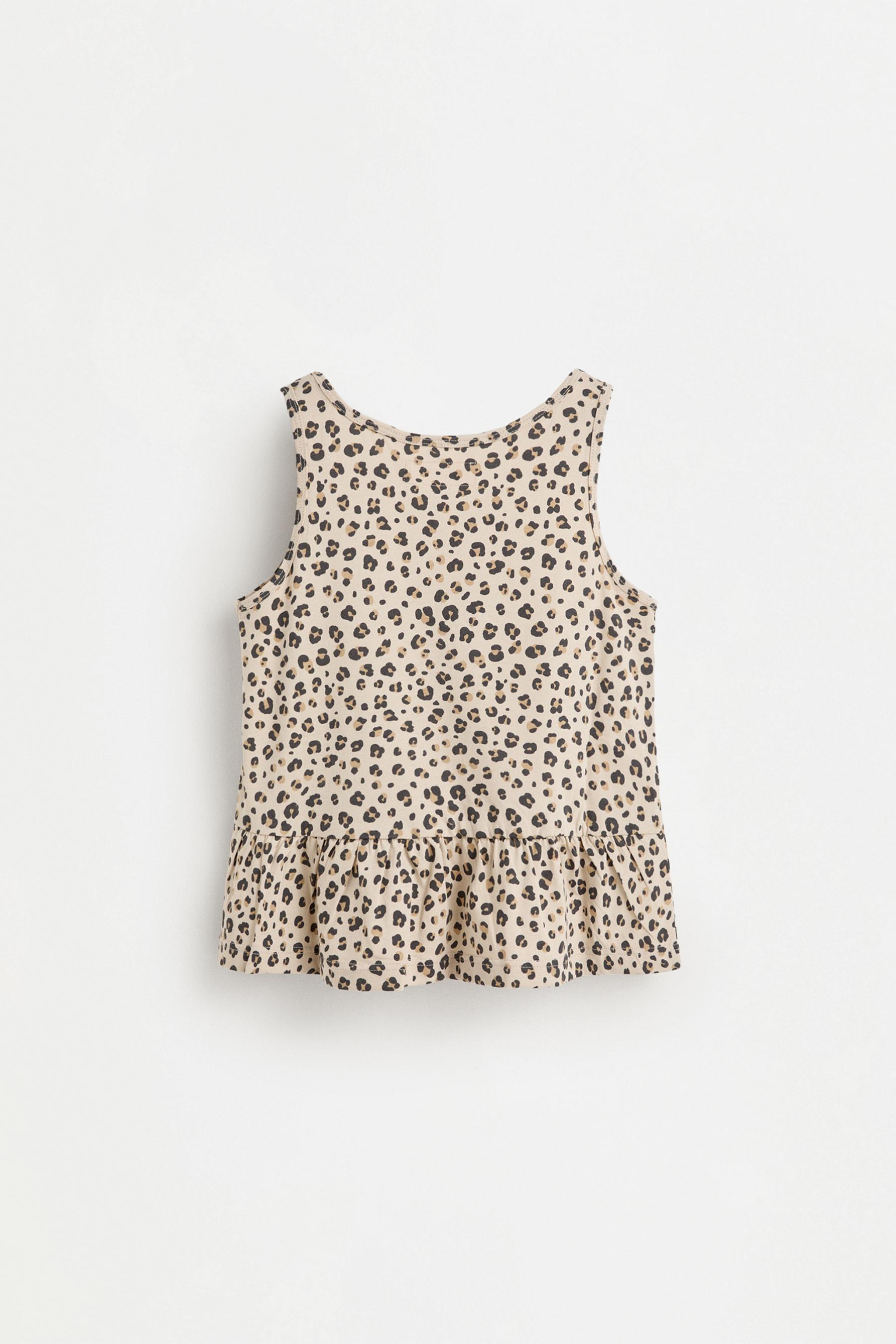 Printed peplum sleeveless t-shirt — HIELO