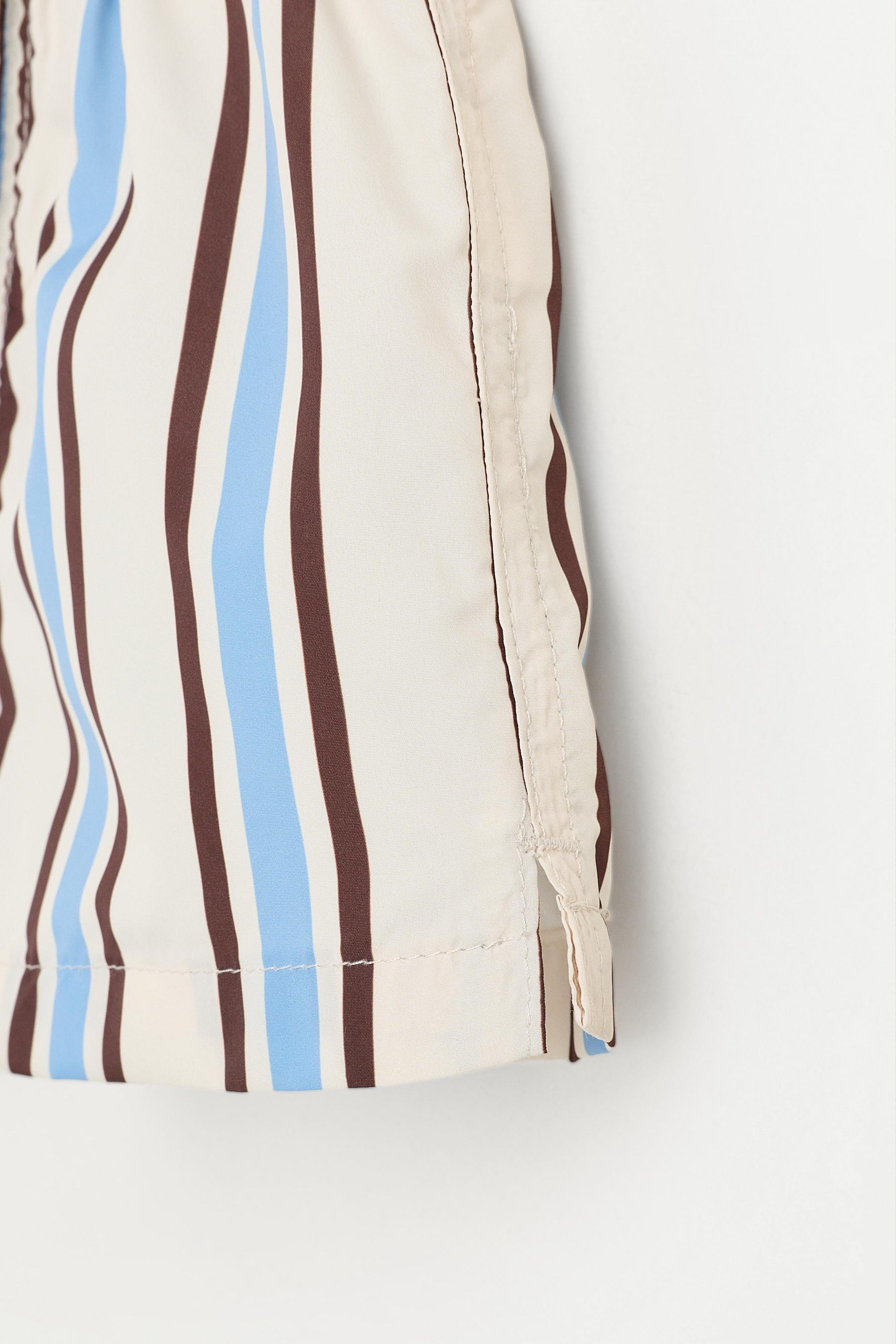 Baby Boy | Brown striped swim shorts — DEEP BLUE