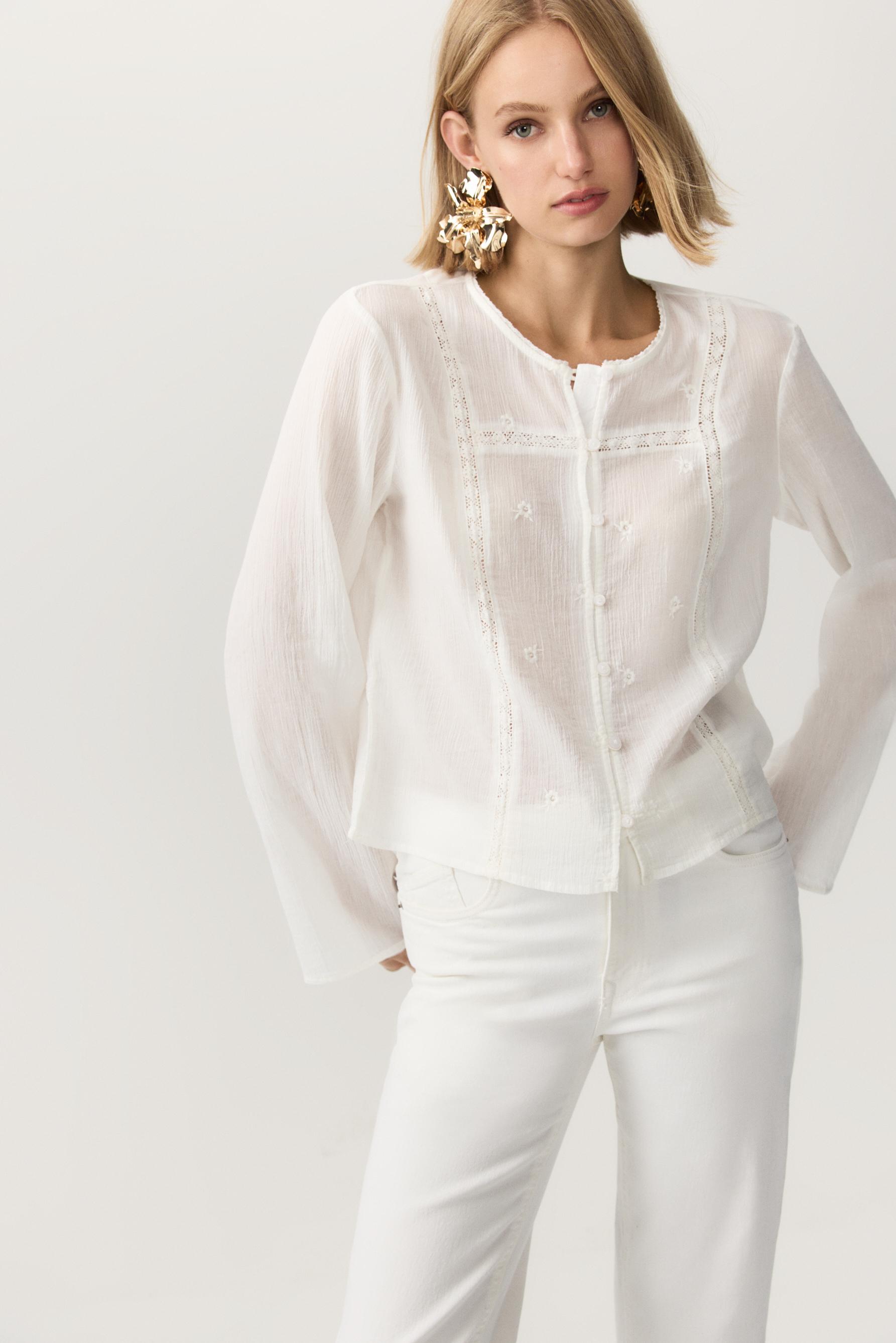 Camisa semitransparente bordados