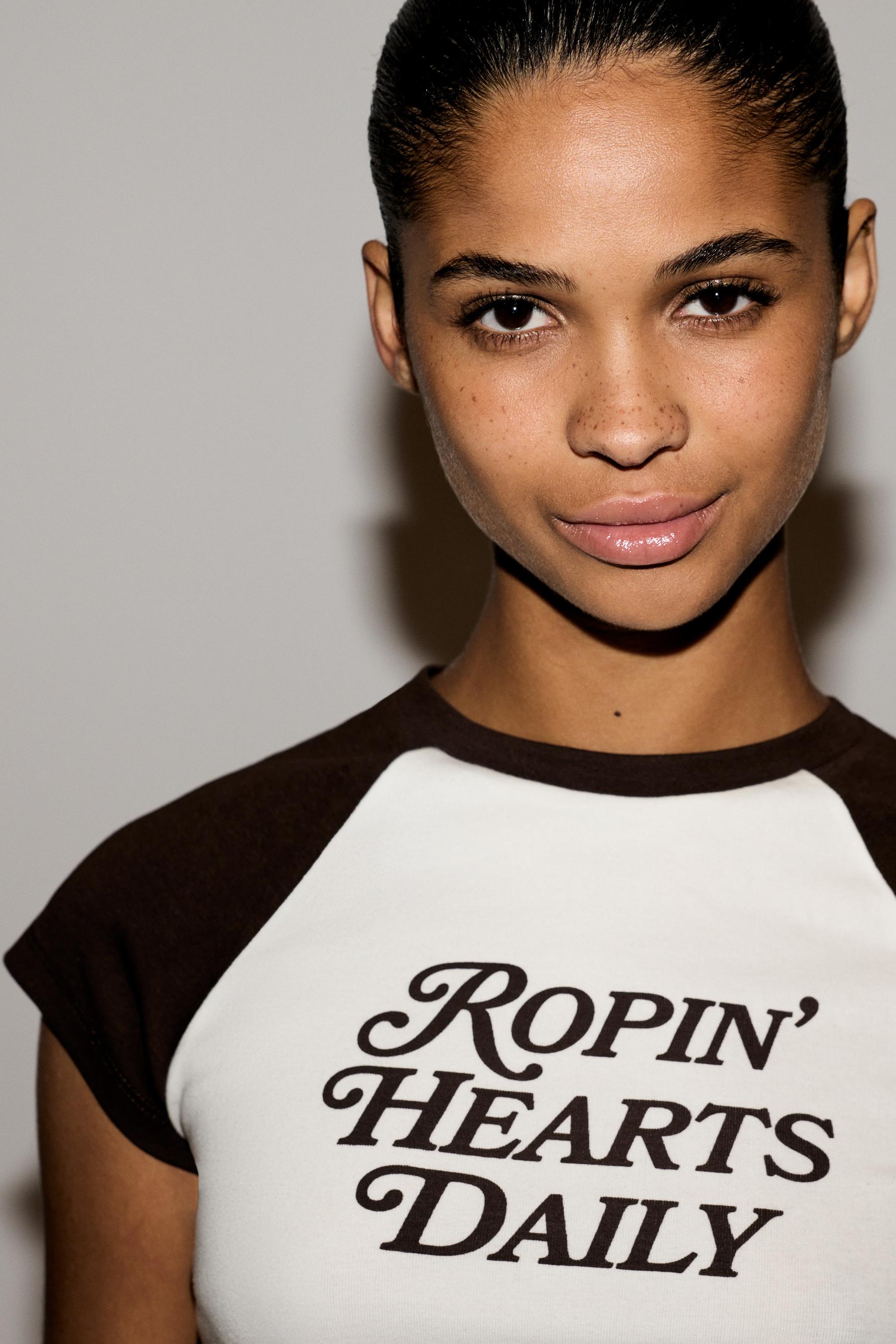 Printed raglan sleeve T-shirt — OFF WHITE