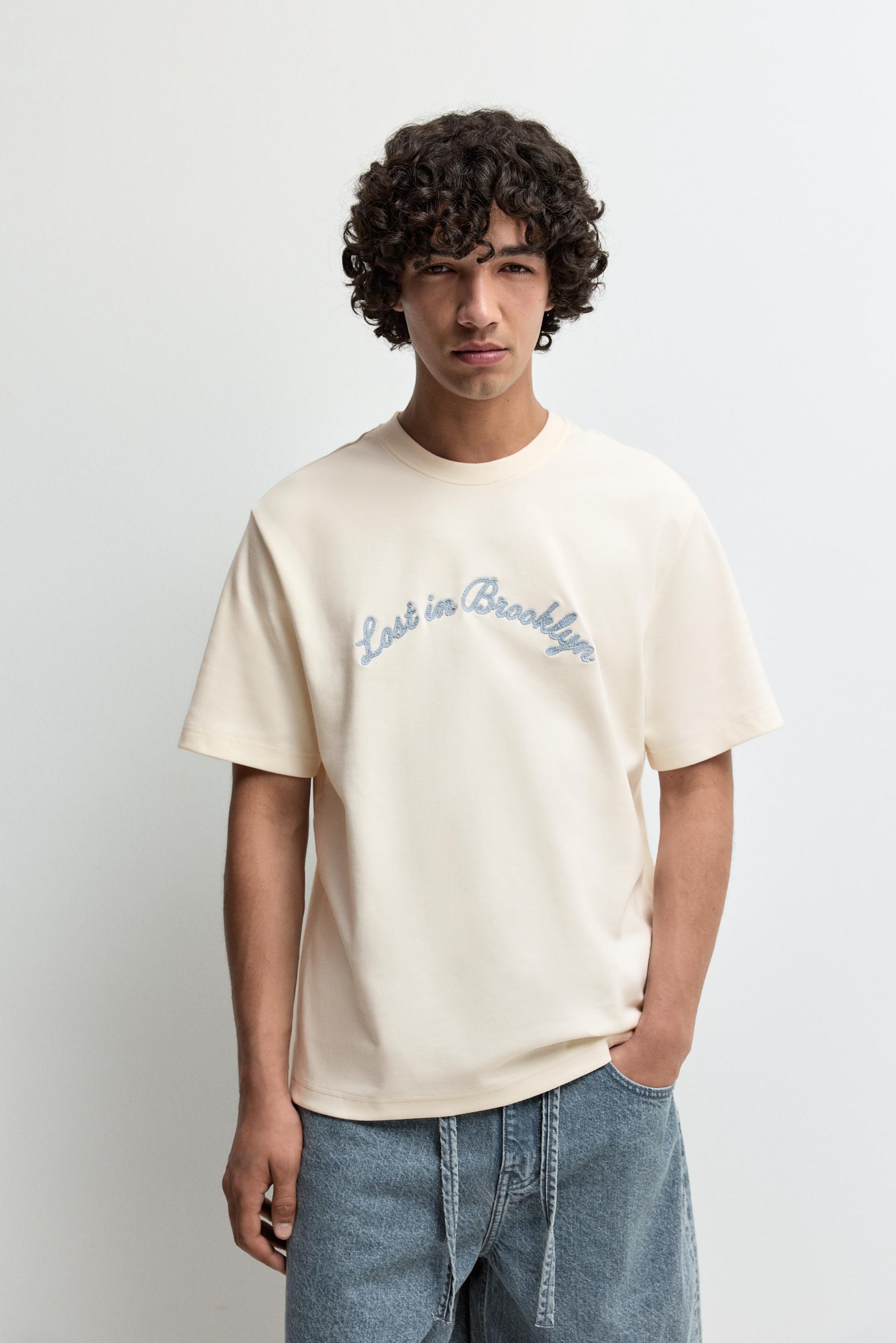 Embroidered interlock T-shirt — BUTTER