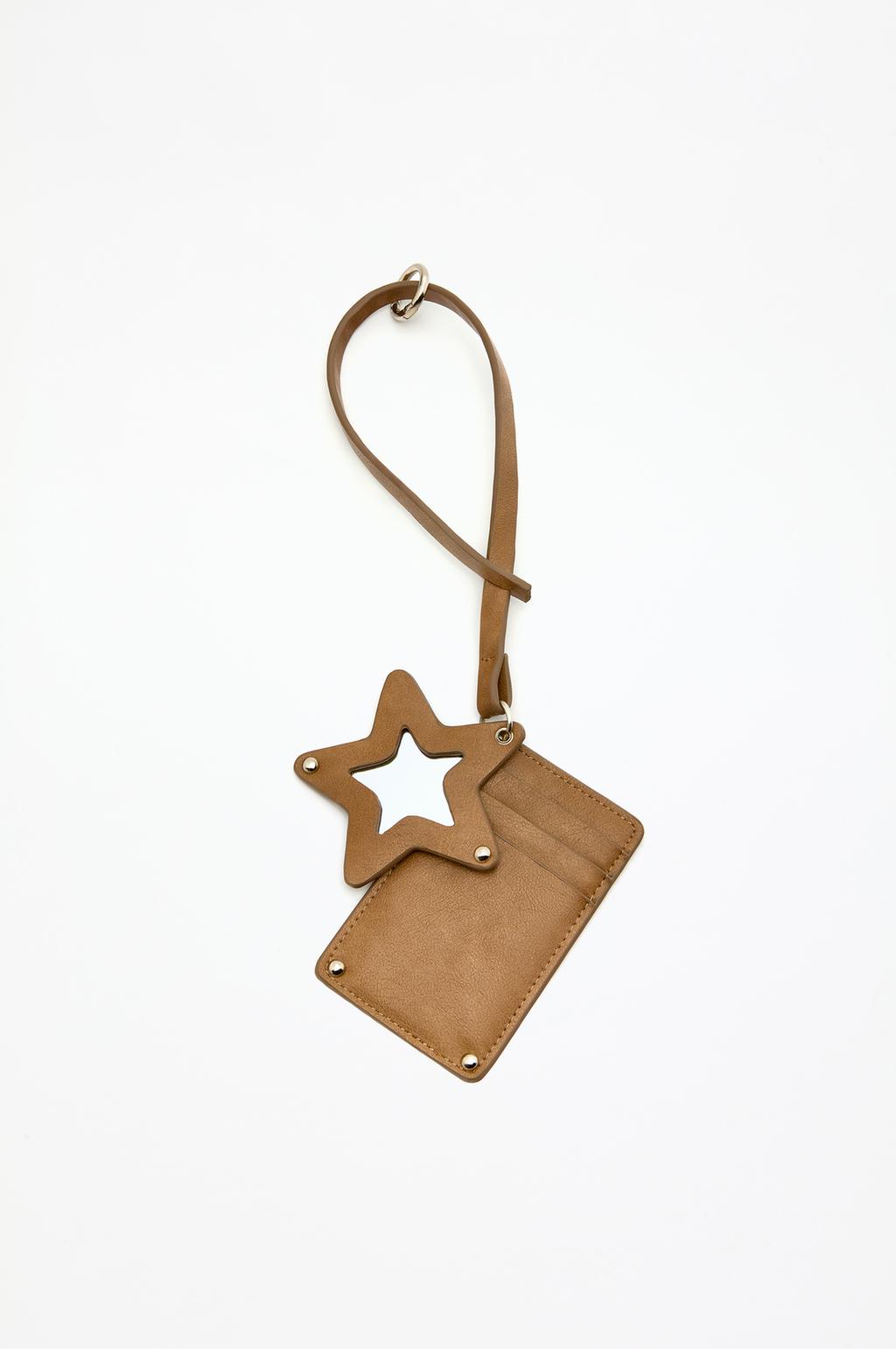 Mirrored star charm