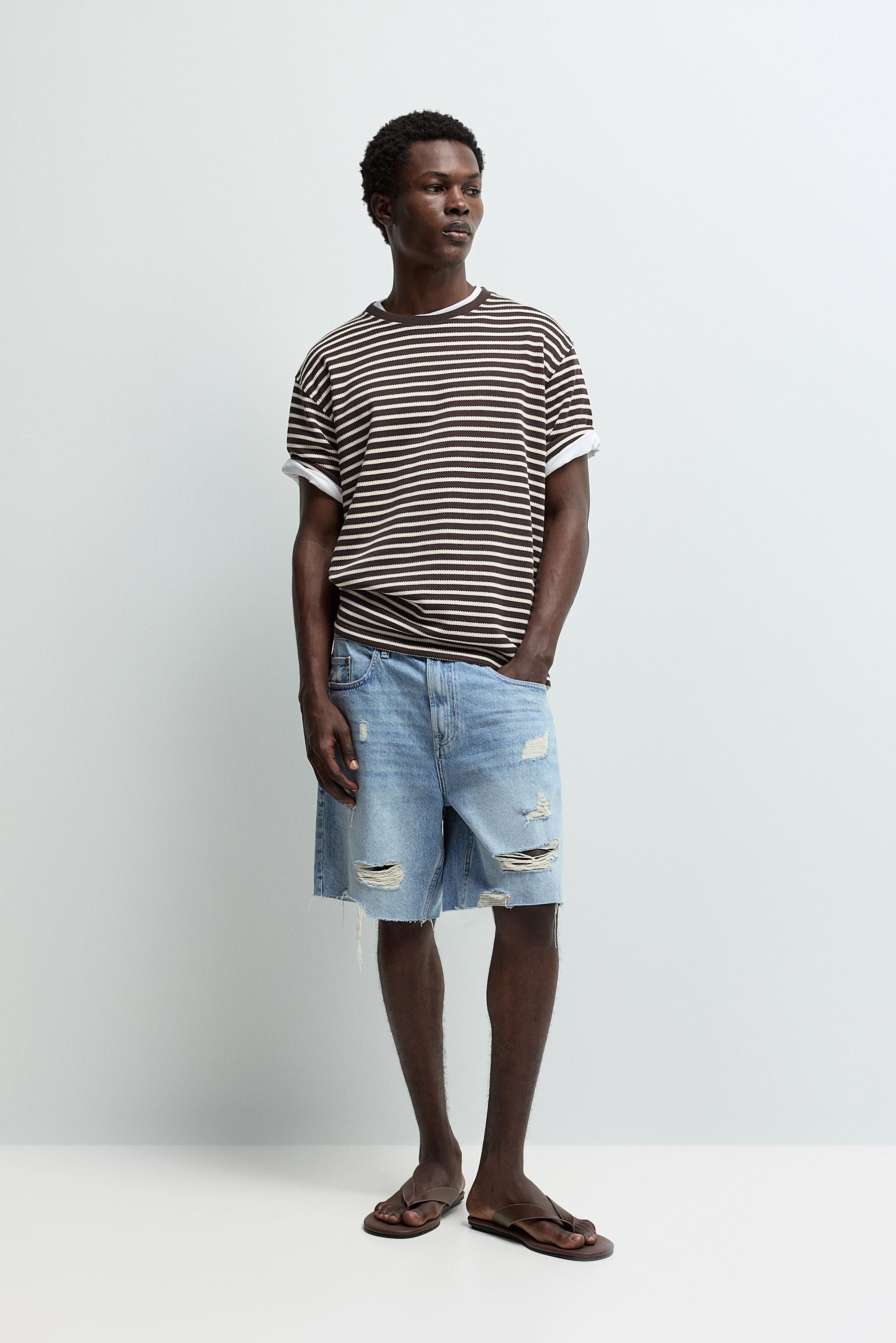 Ripped denim Bermuda shorts — PALE BLUE
