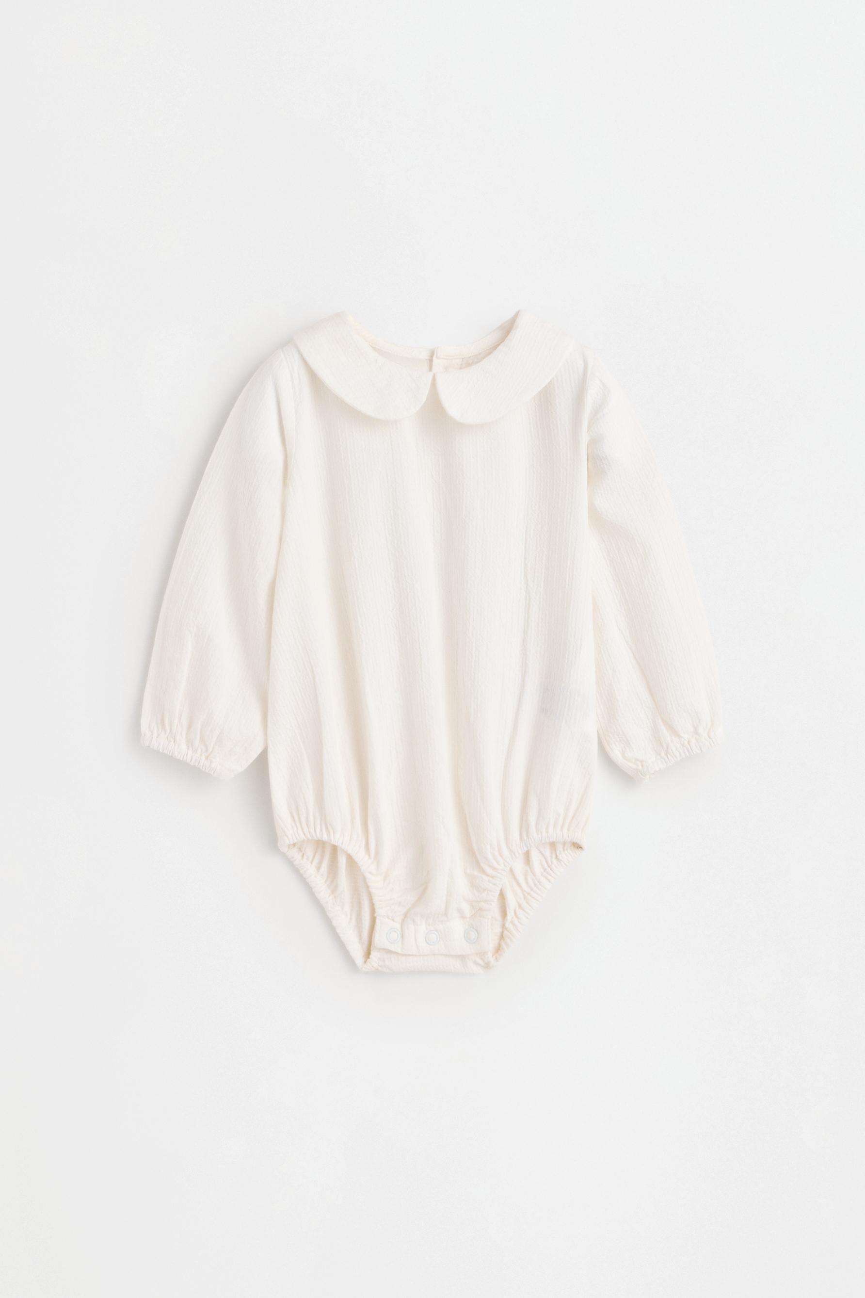 Body cuello volante