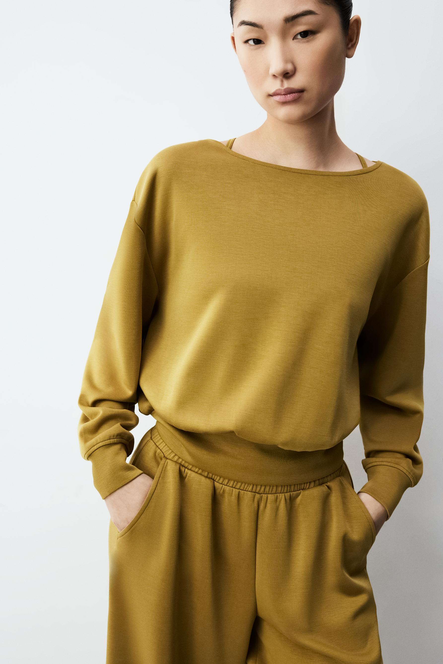 Sudadera fluida cuello barca