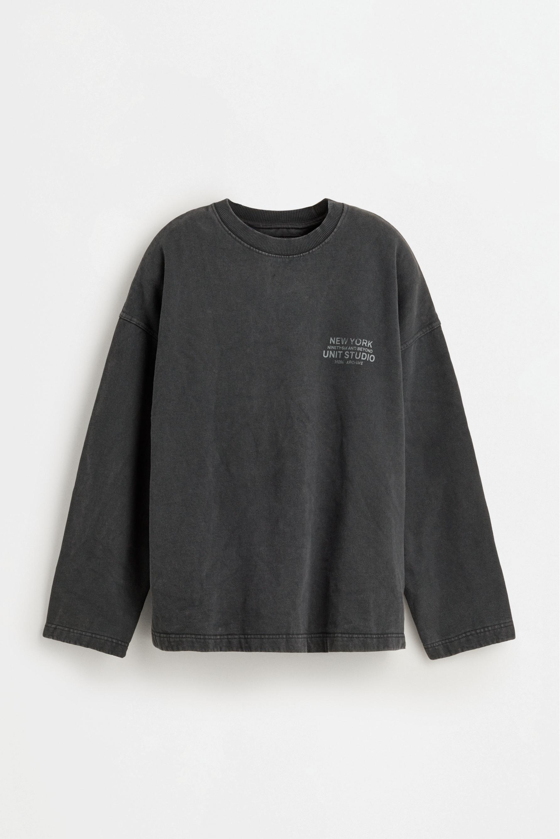 Sudadera efecto lavado texto