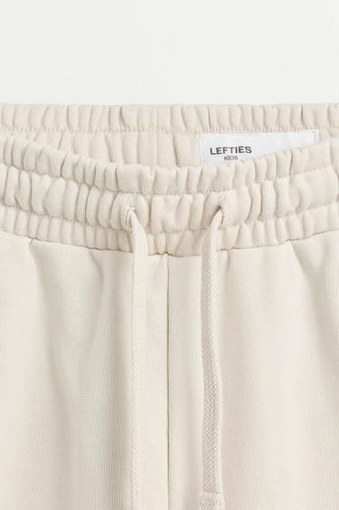 Plush Bermuda shorts with text — PALE MINK 4