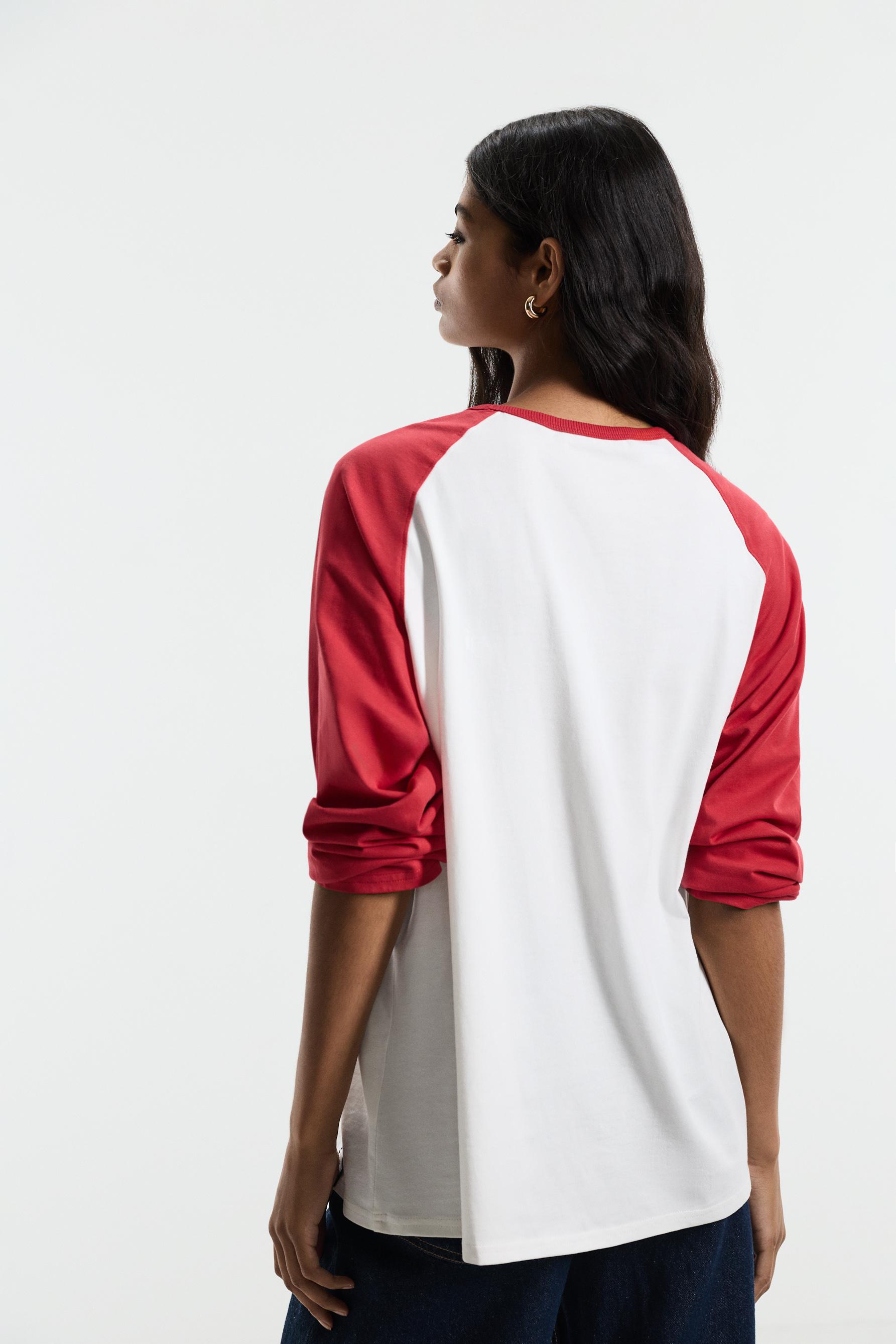 Snoopy Peanuts™ raglan sleeve T-shirt — OFF WHITE