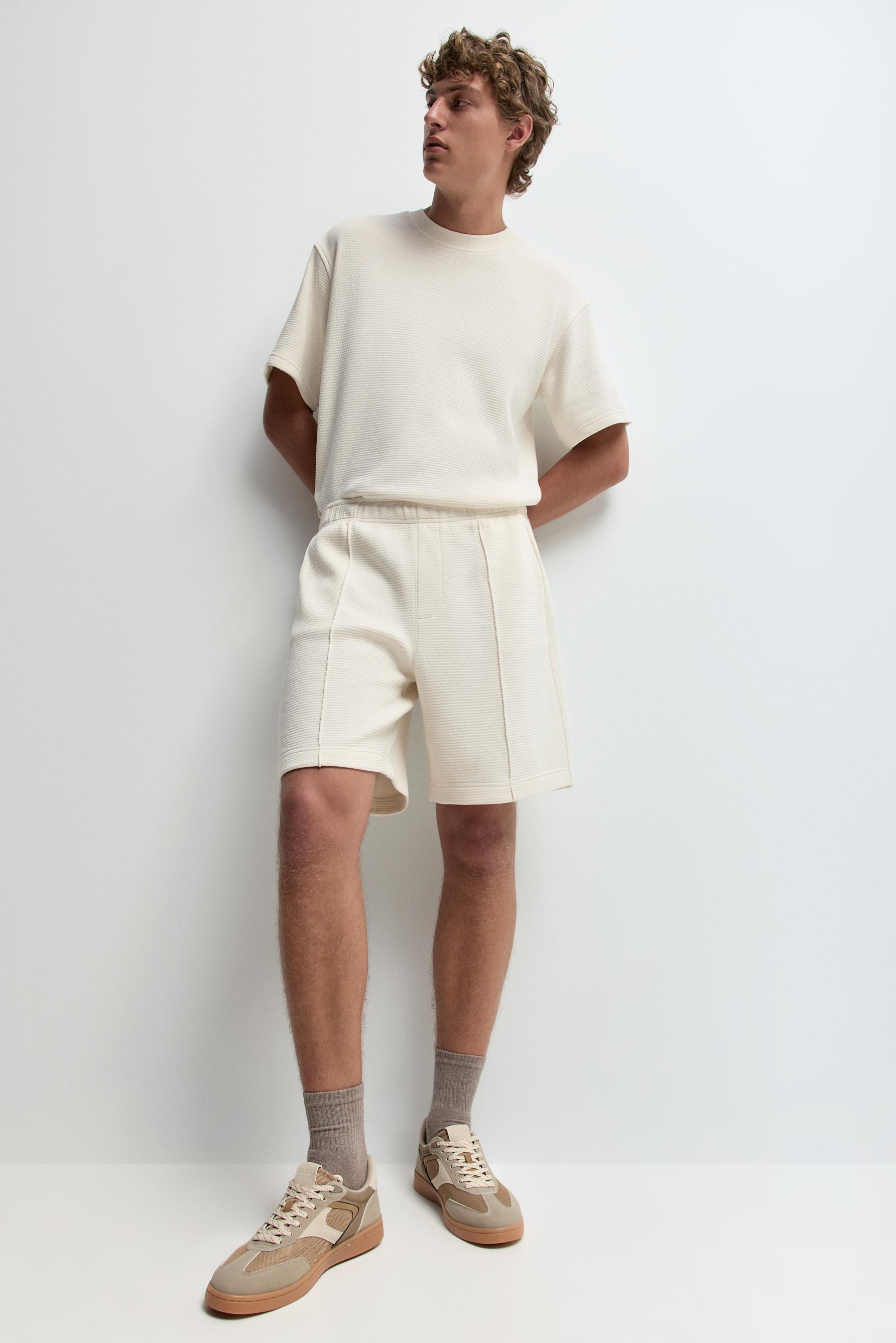 Waffle-textured Bermuda shorts — ECRU
