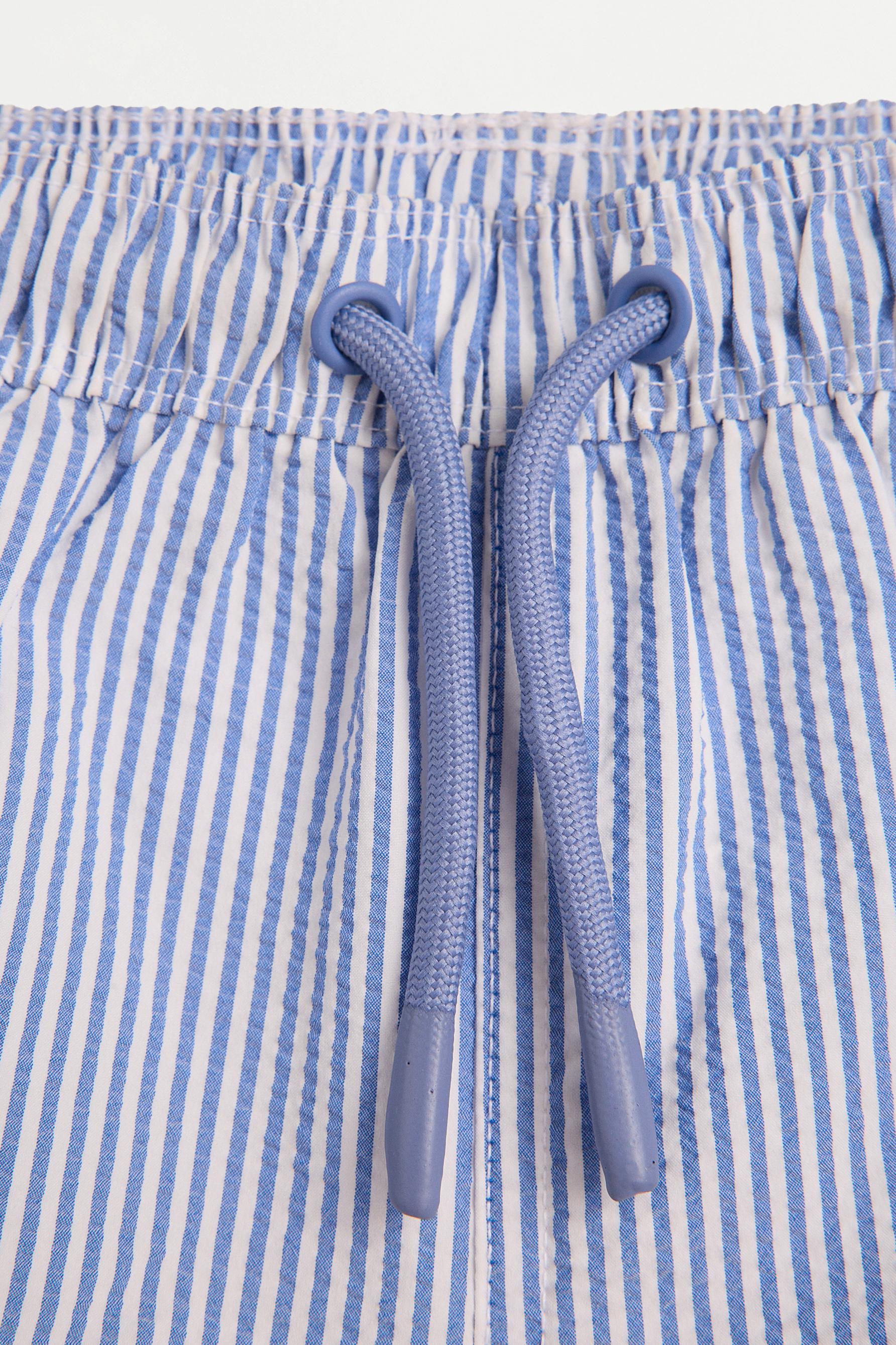 Striped seersucker swim shorts — BLUE