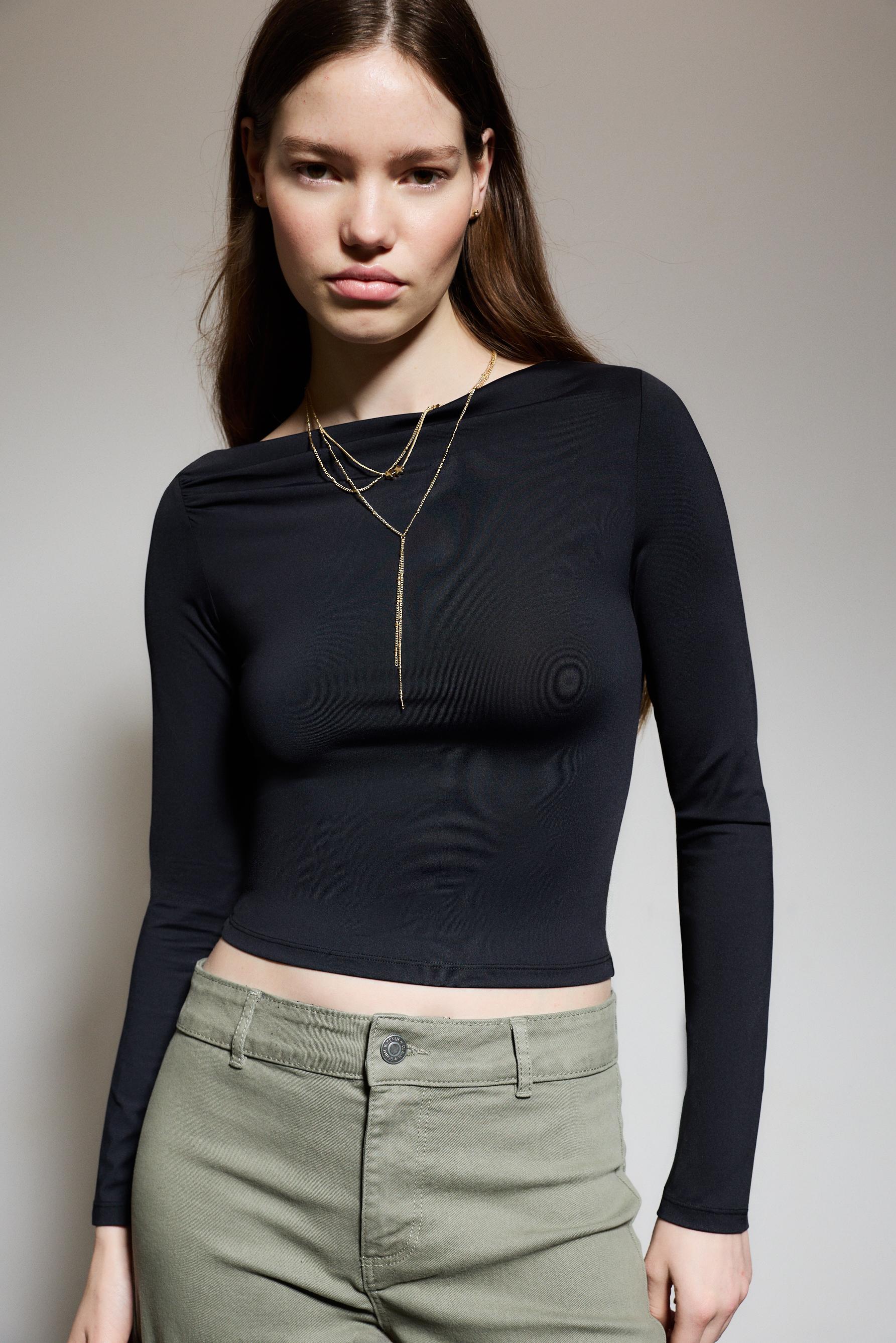 Camiseta poliamida cuello asimétrico