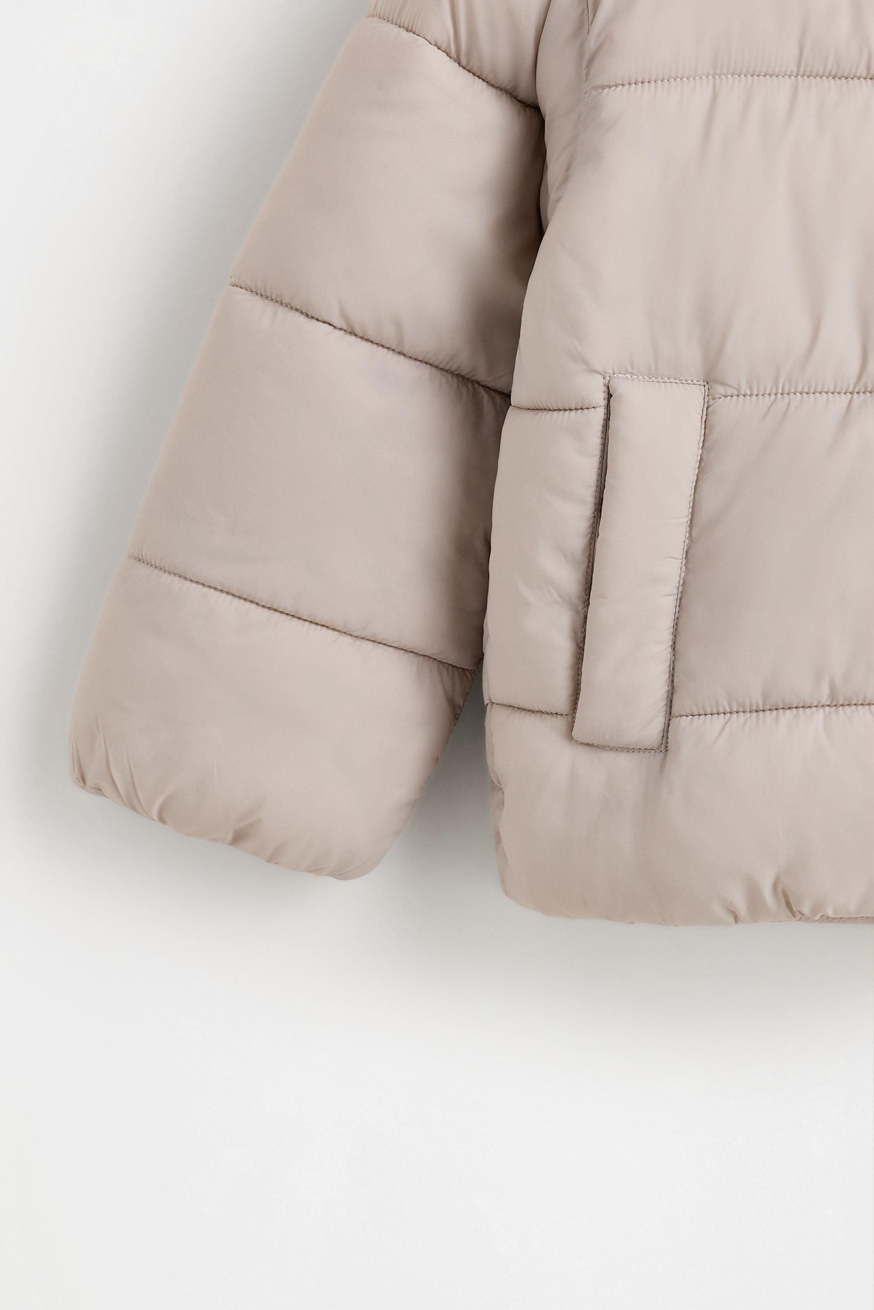 Hooded quilted jacket — HIELO