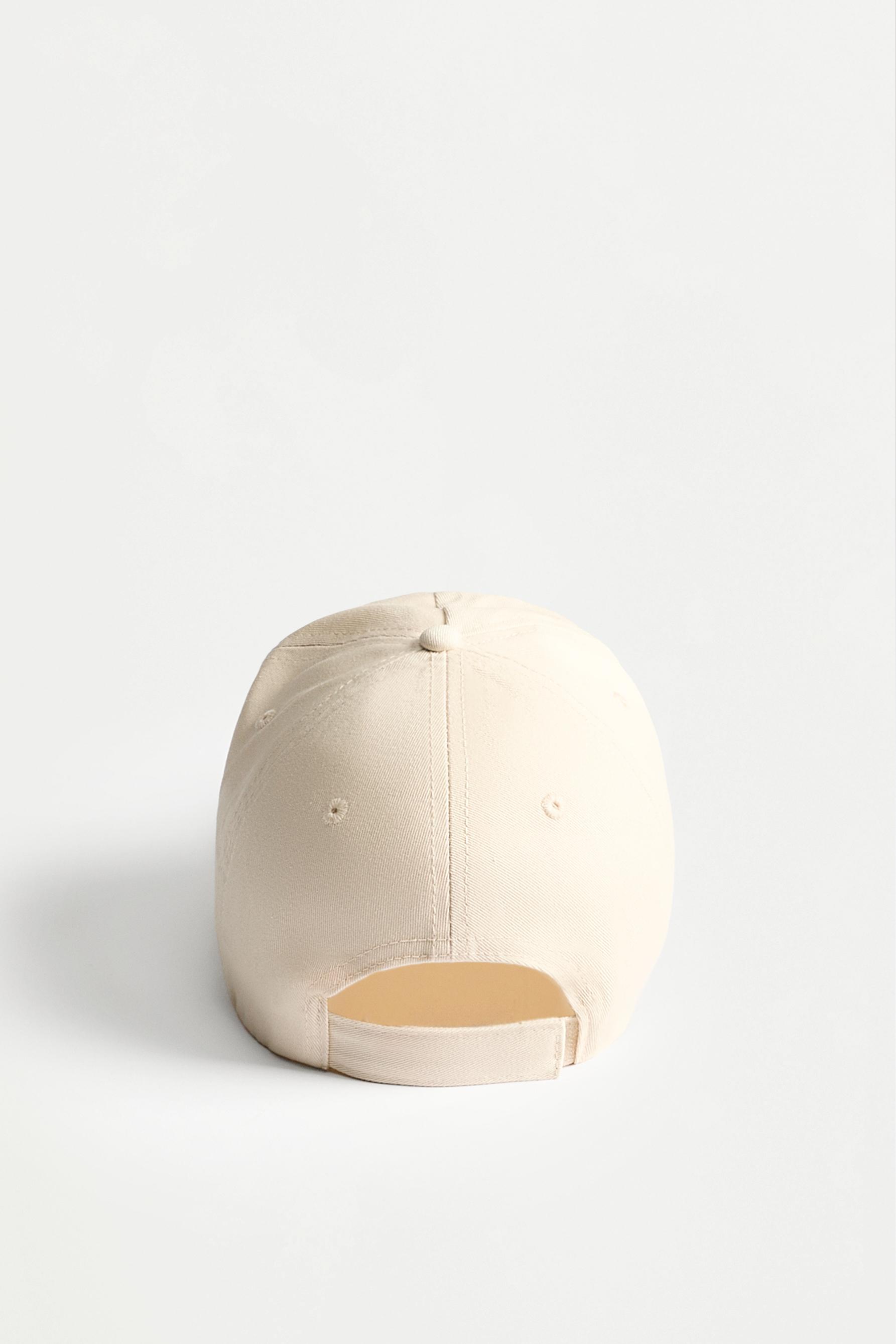 Slogan embroidered cap — ECRU