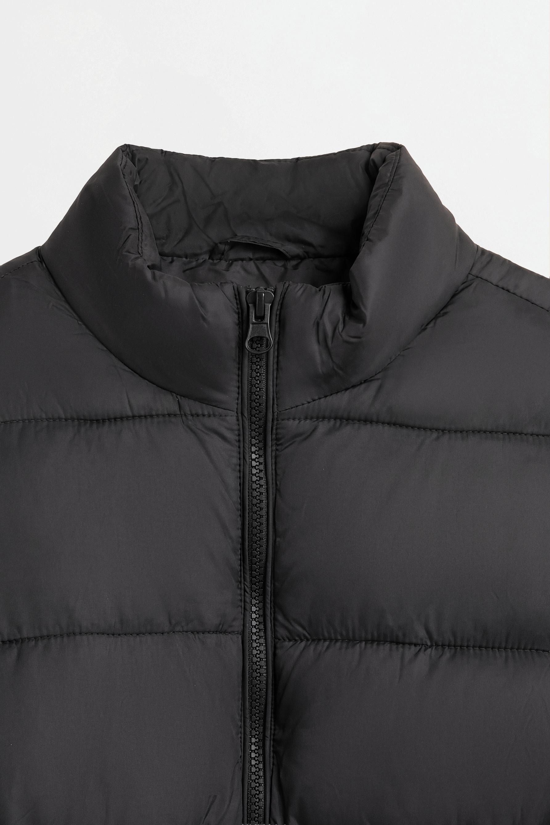 Quilted jacket with interlock sleeves — BLACK