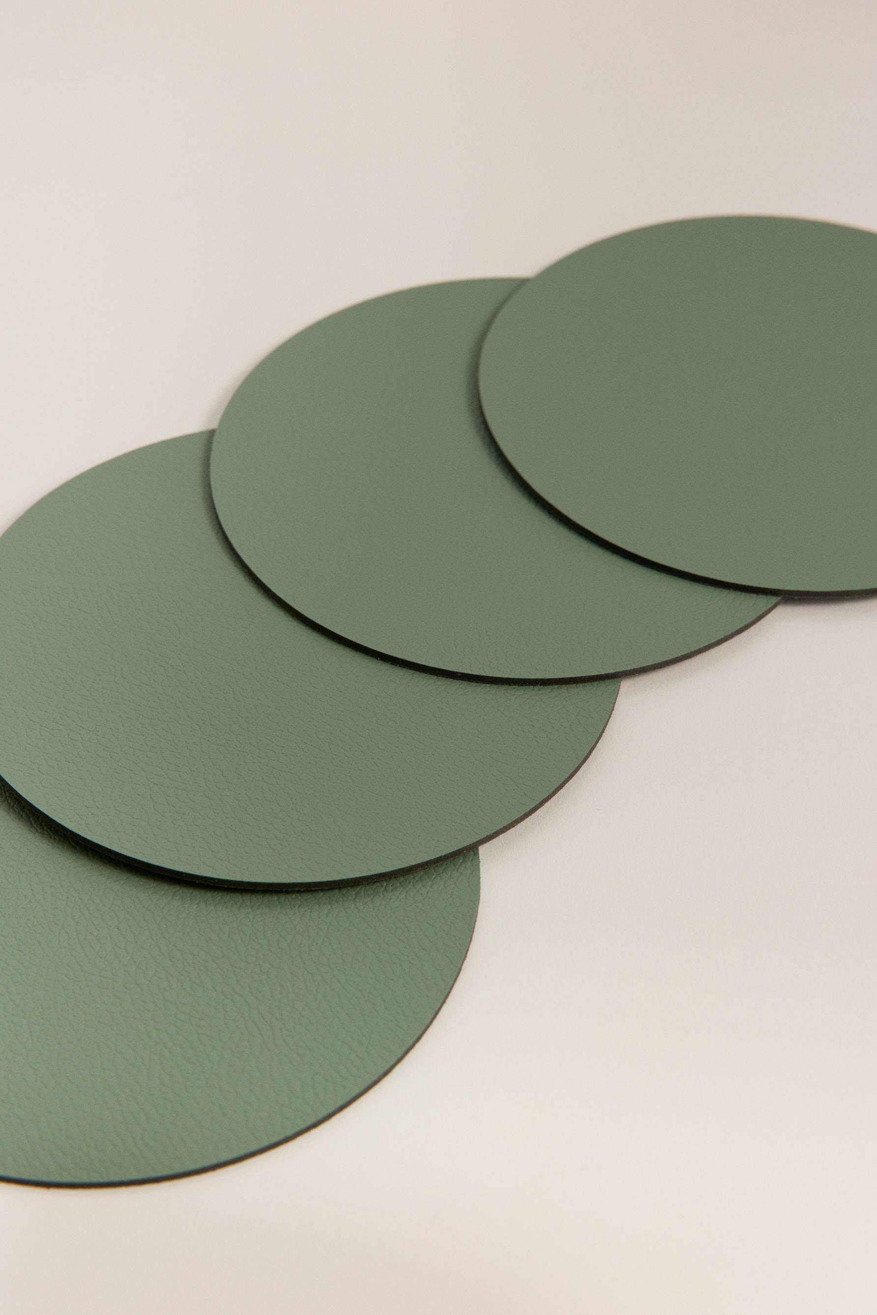 Pack 4 posavasos piel 11 cm