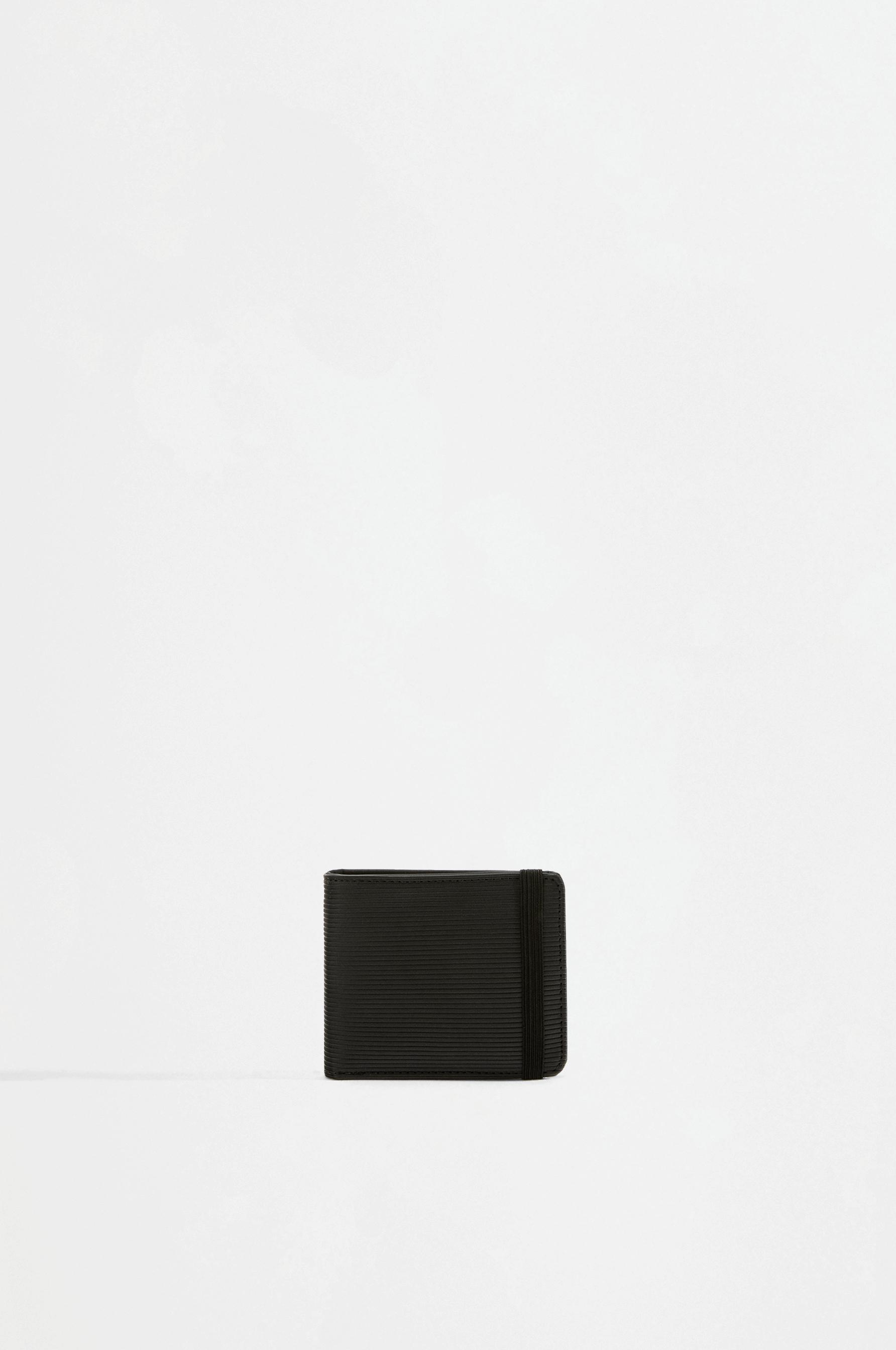 Cartera engomada