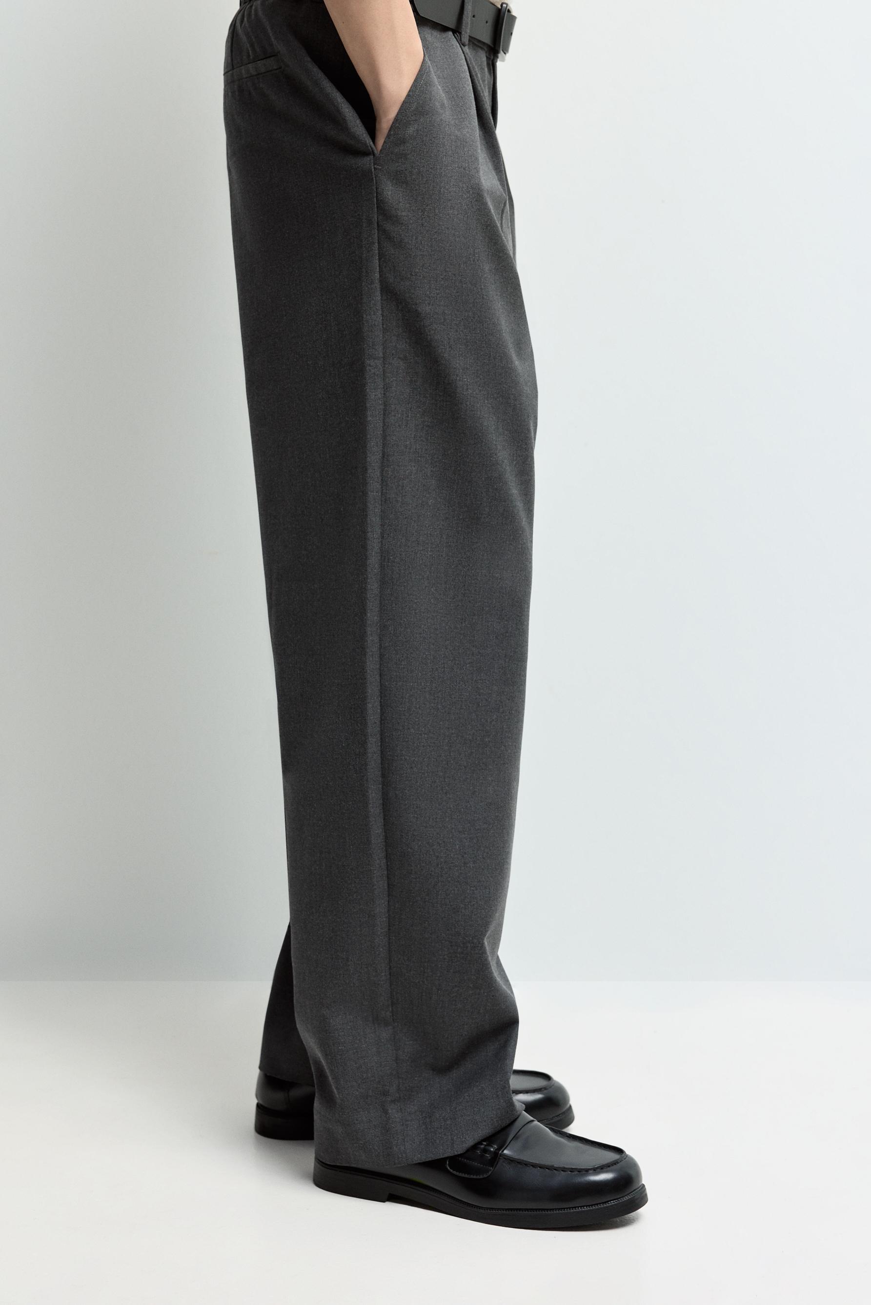 Baggy trousers with darts — DARK GREY MARL