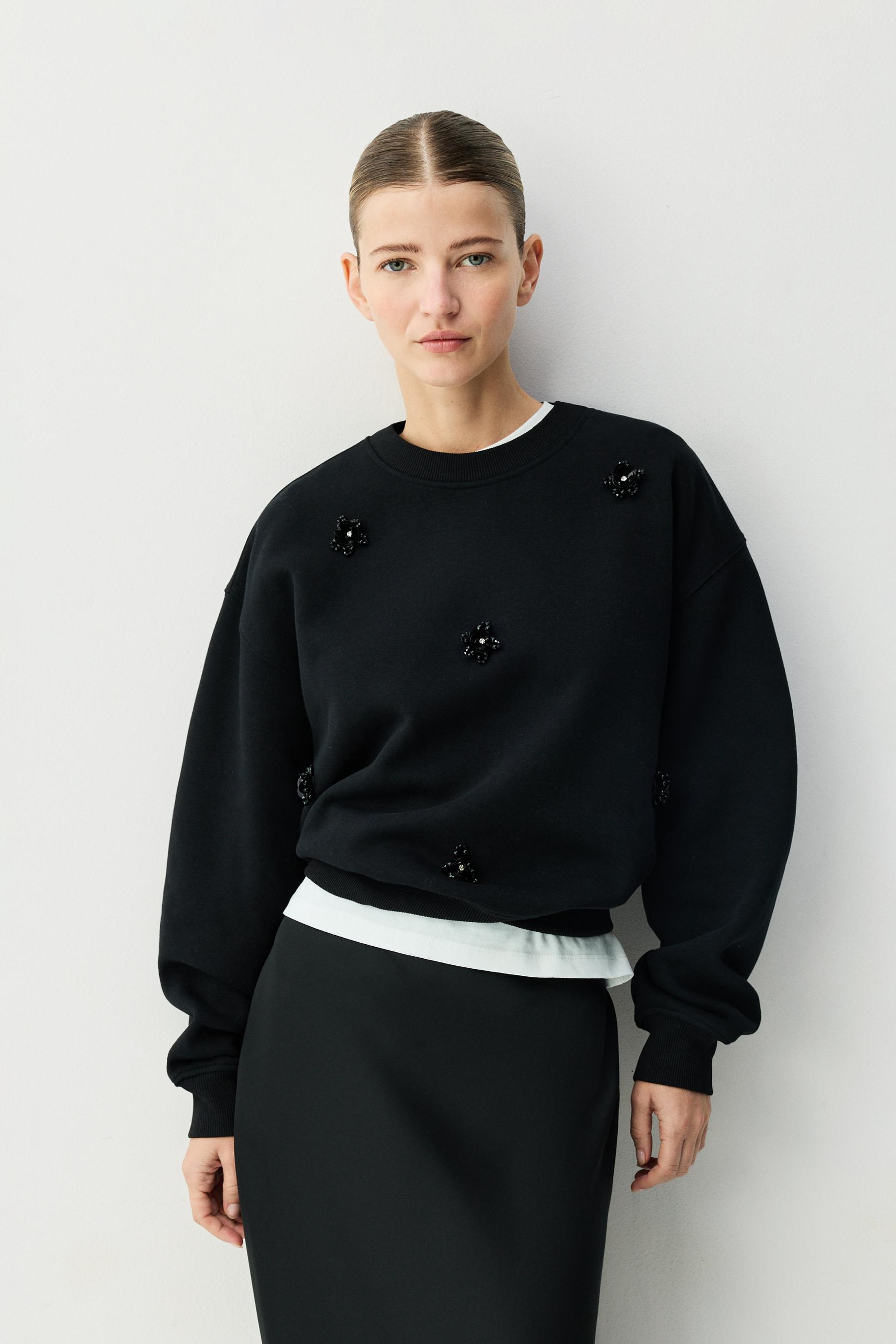 Sudadera abalorios flores