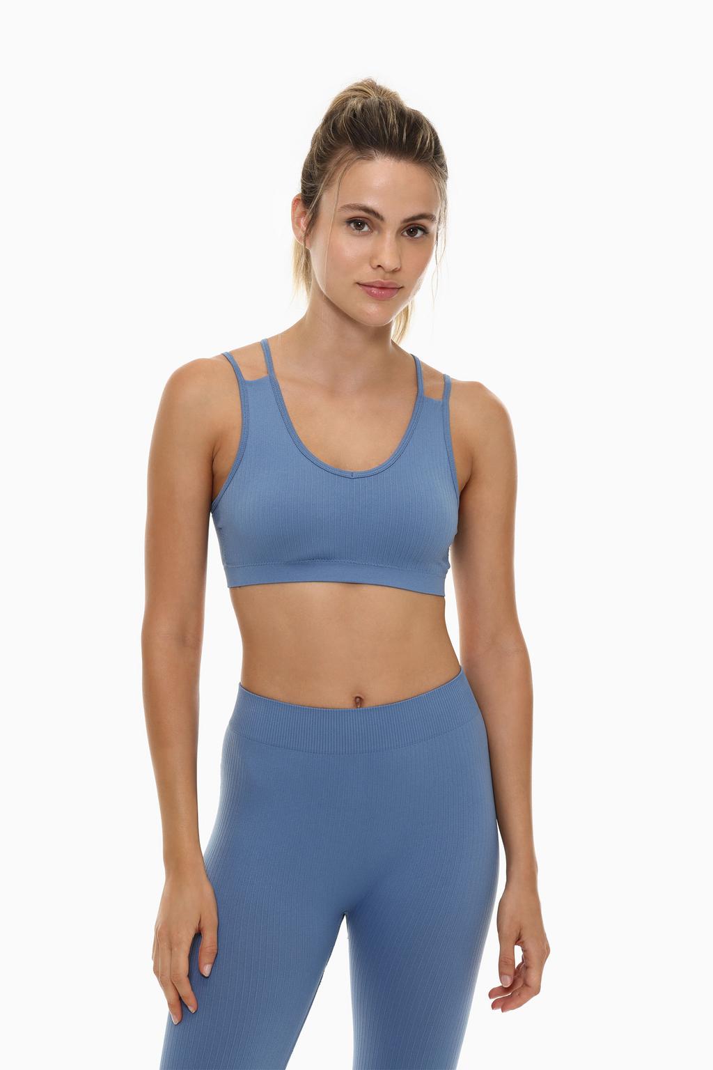 Top deportivo seamless canalé doble tirante