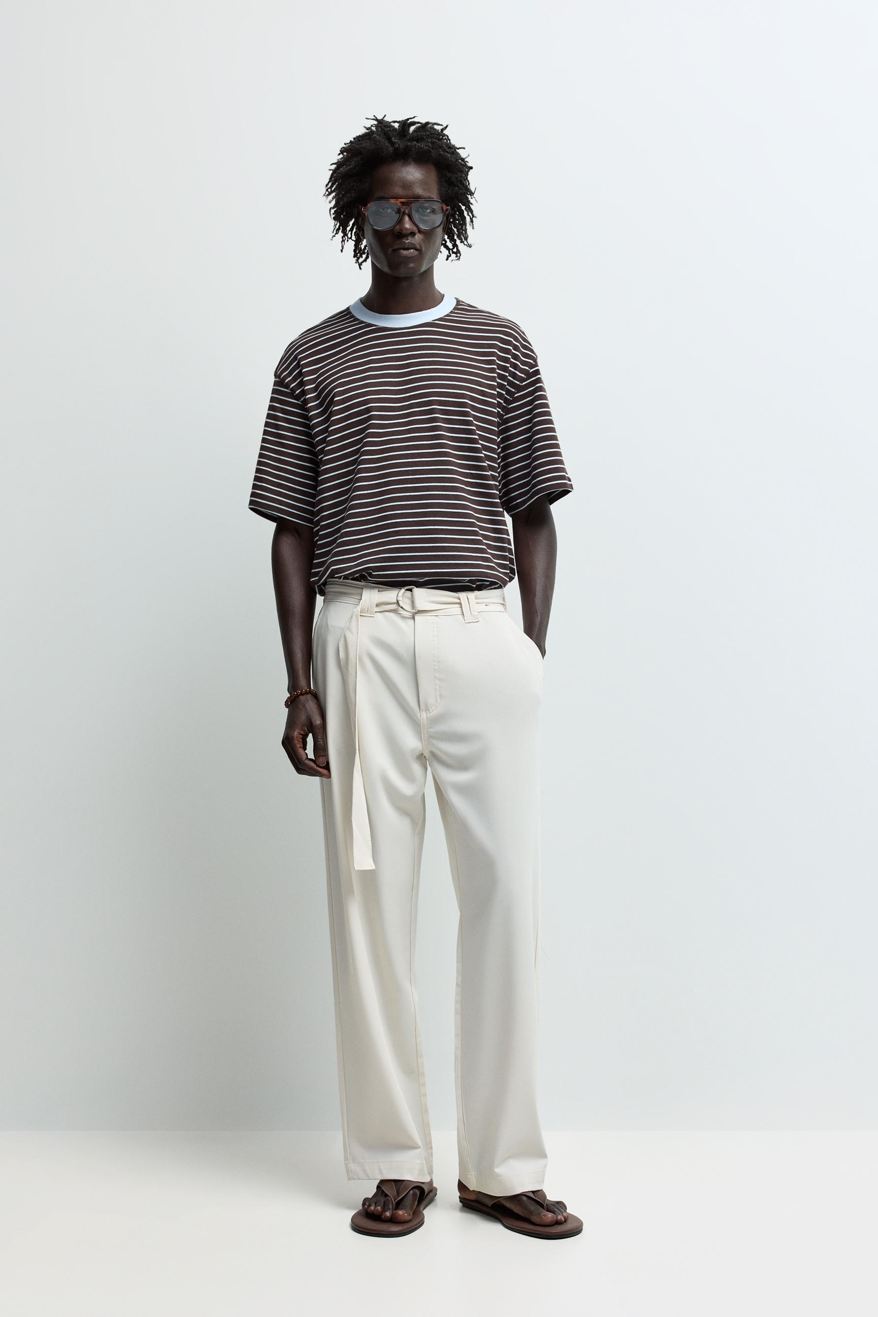 Relaxed fit chino trousers with belt — OFF WHITE