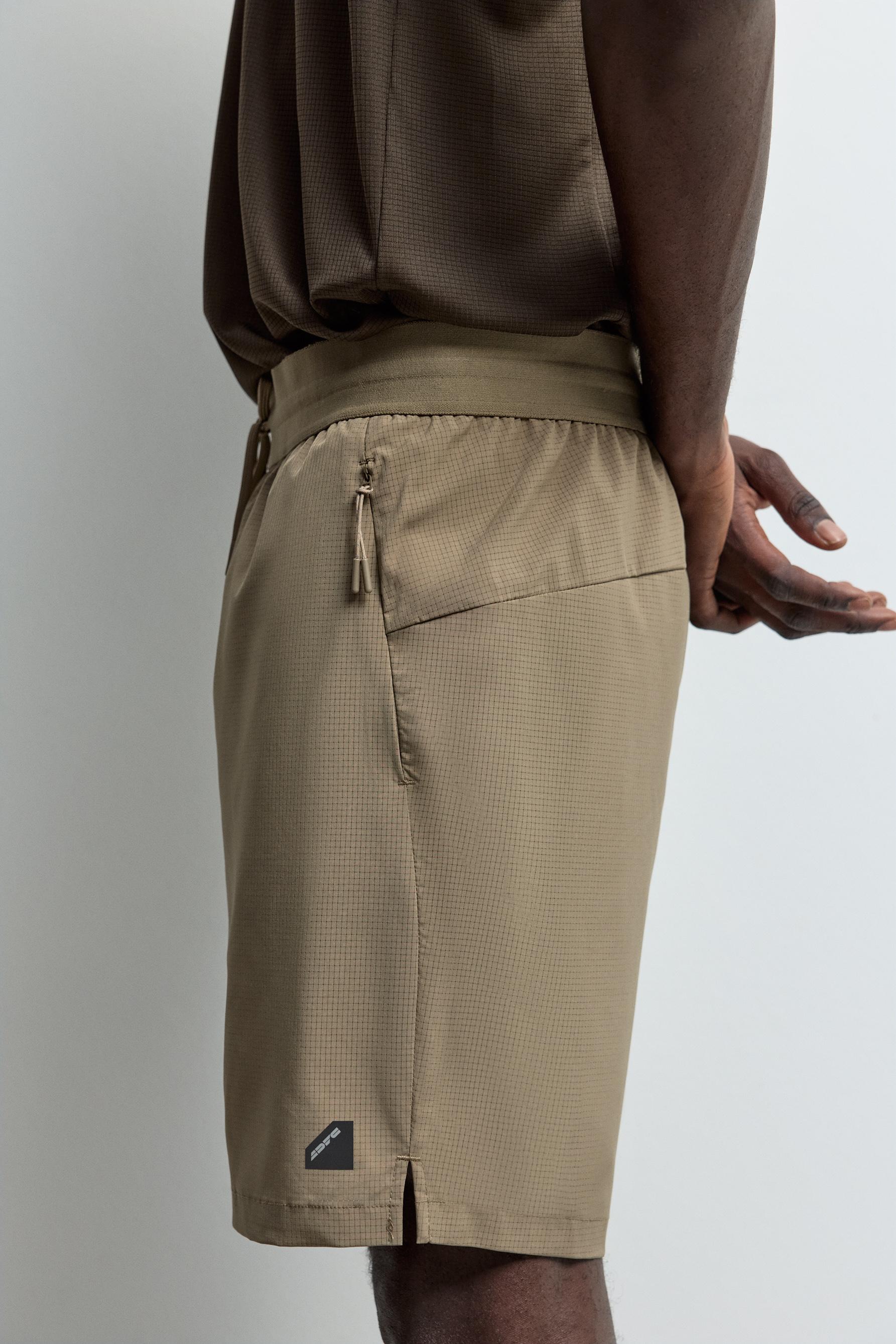 Bermuda sports shorts — MINK