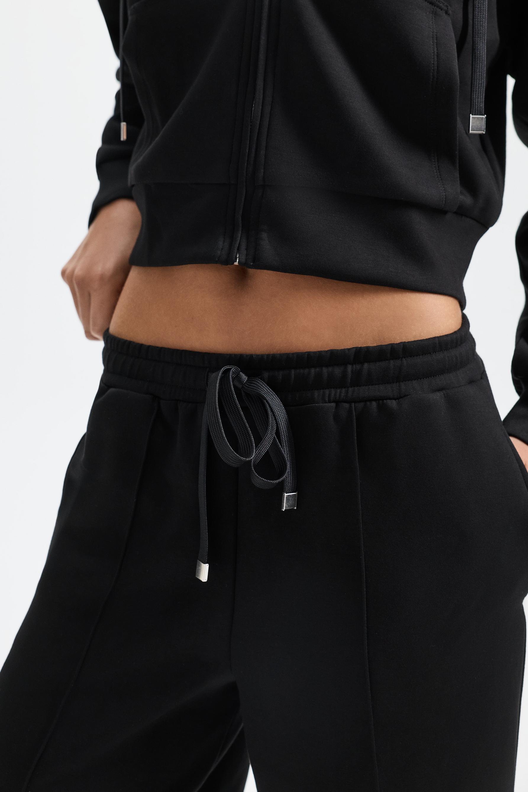 Wide-leg tracksuit trousers with front seam — BLACK