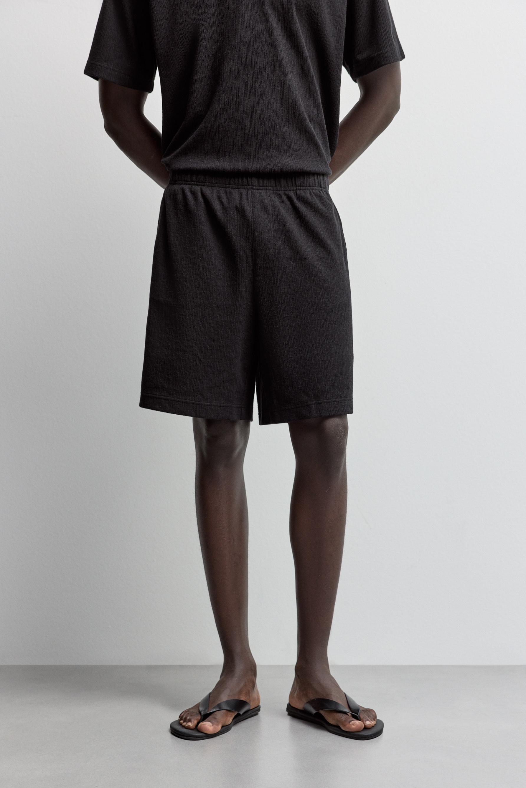 Rustic textured Bermuda shorts — BLACK