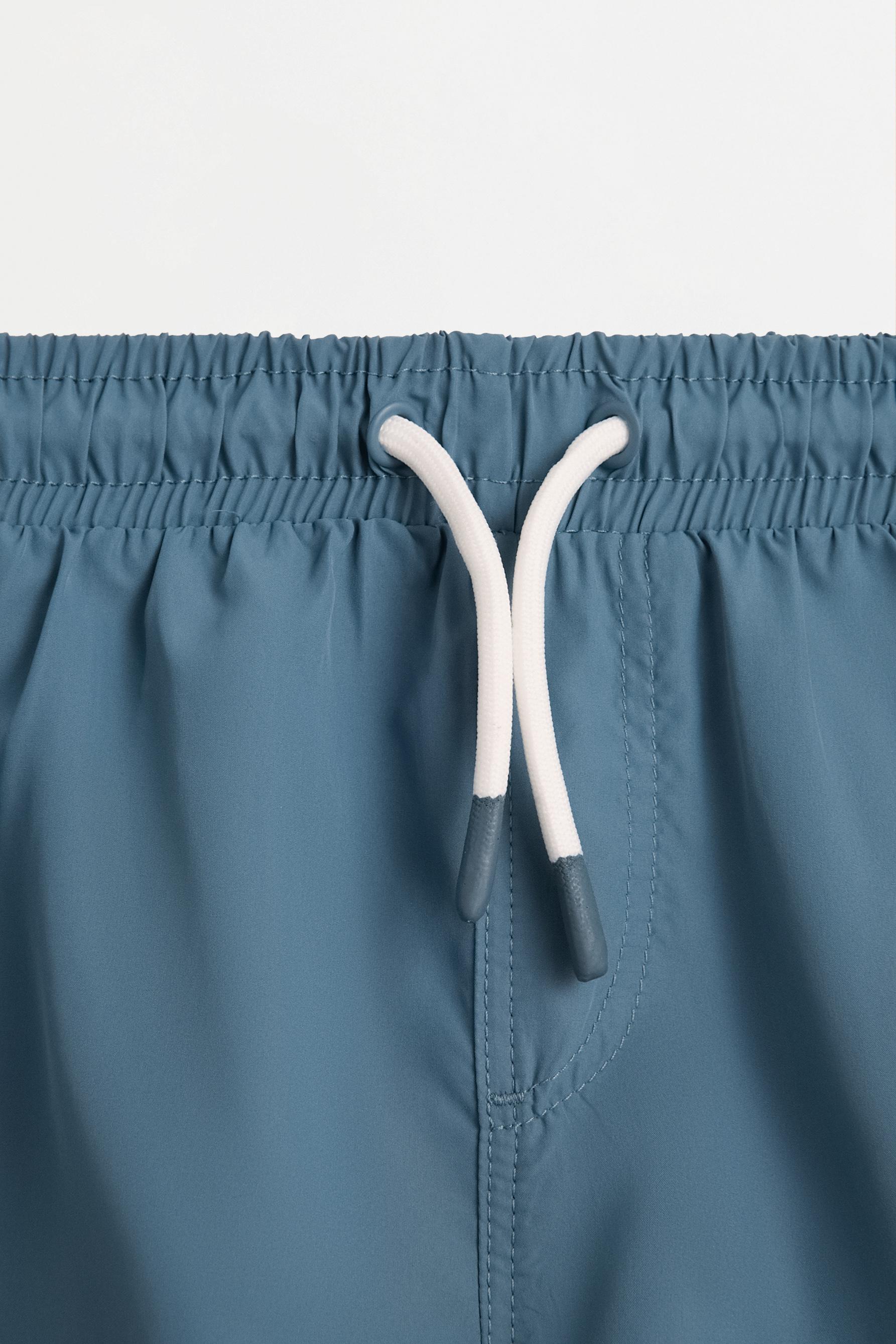 Contrast-line swim shorts — GREENISH BLUE