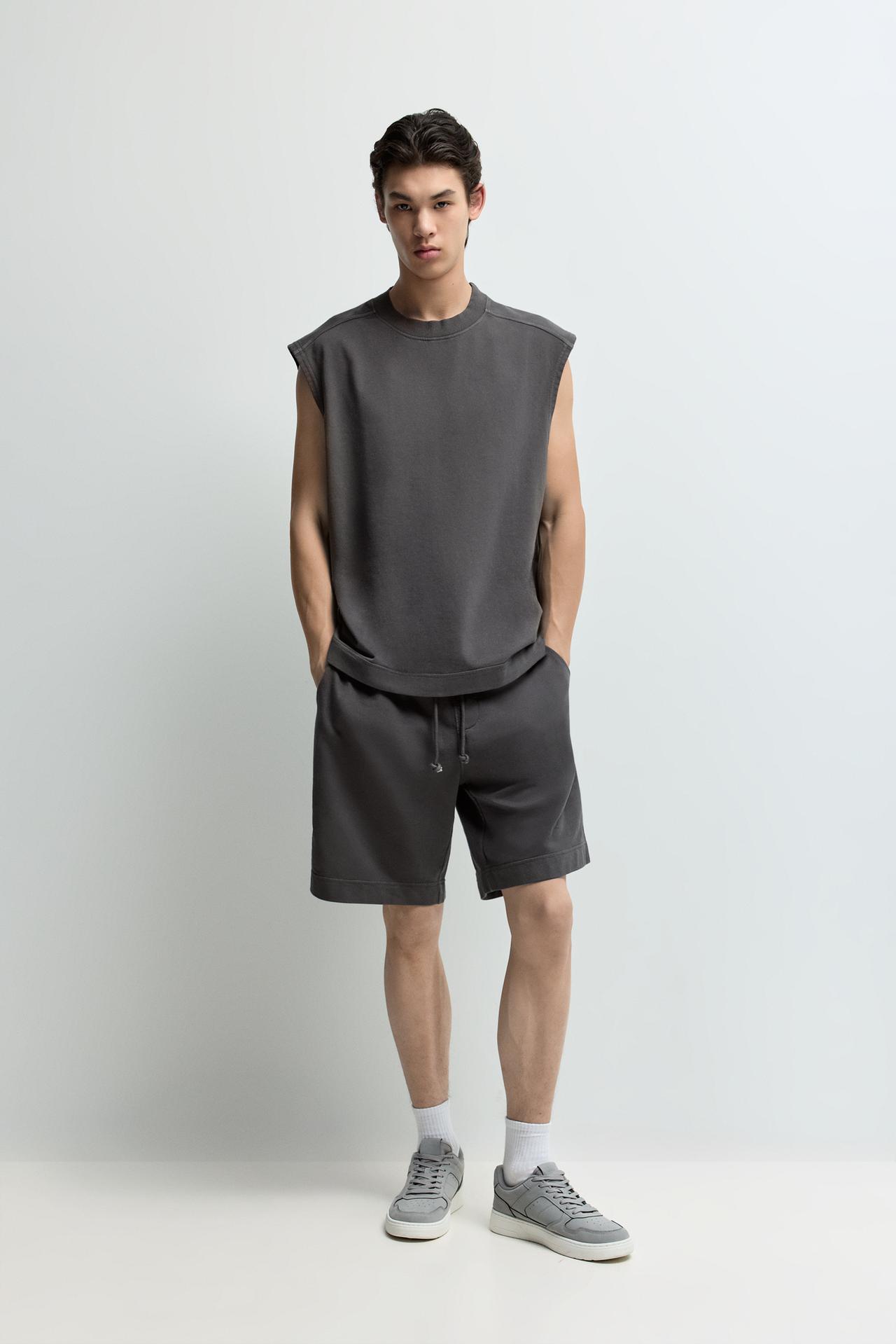 Washed-effect sleeveless sweatshirt — BLACK