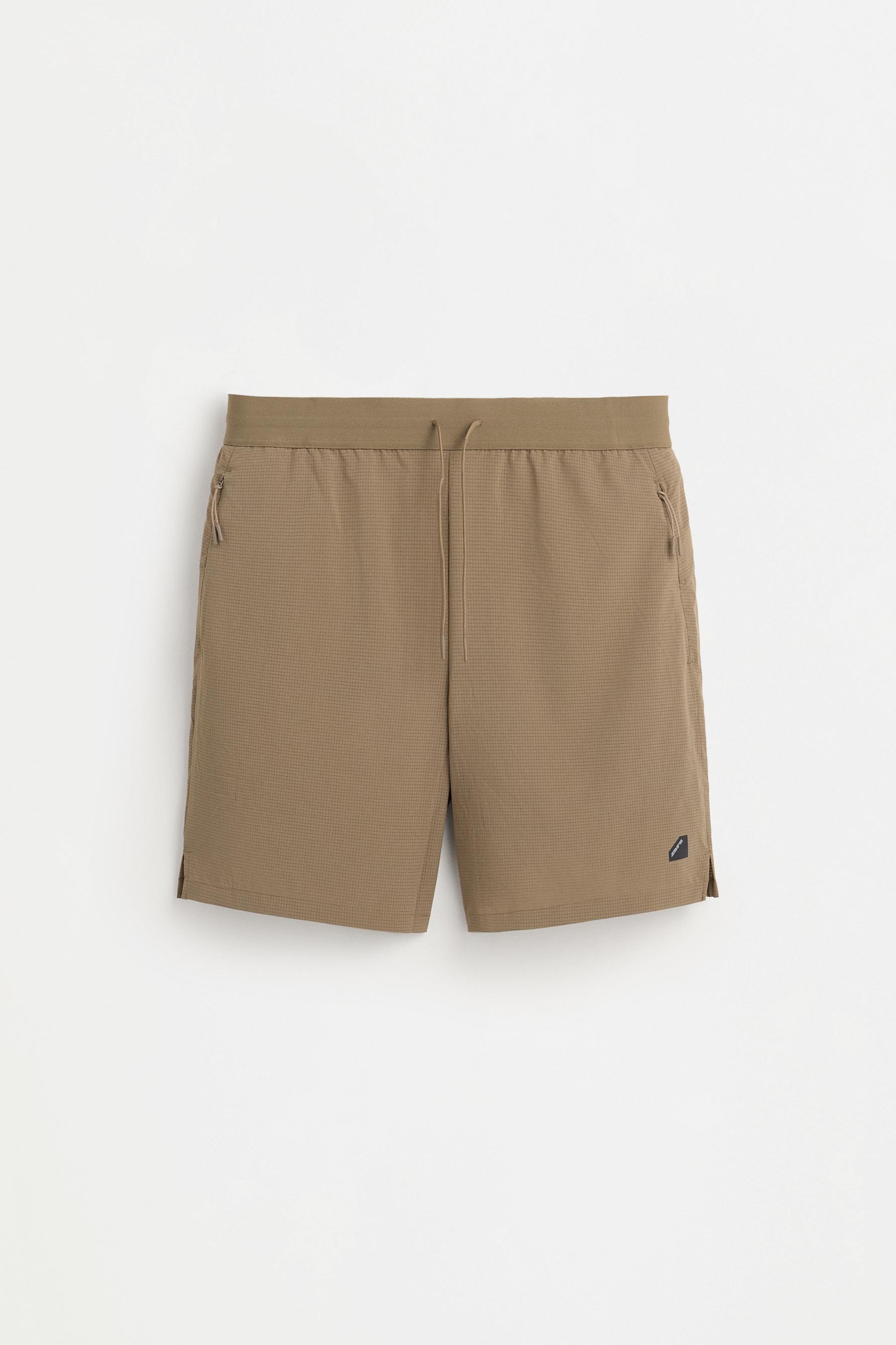 Bermuda sports shorts — MINK