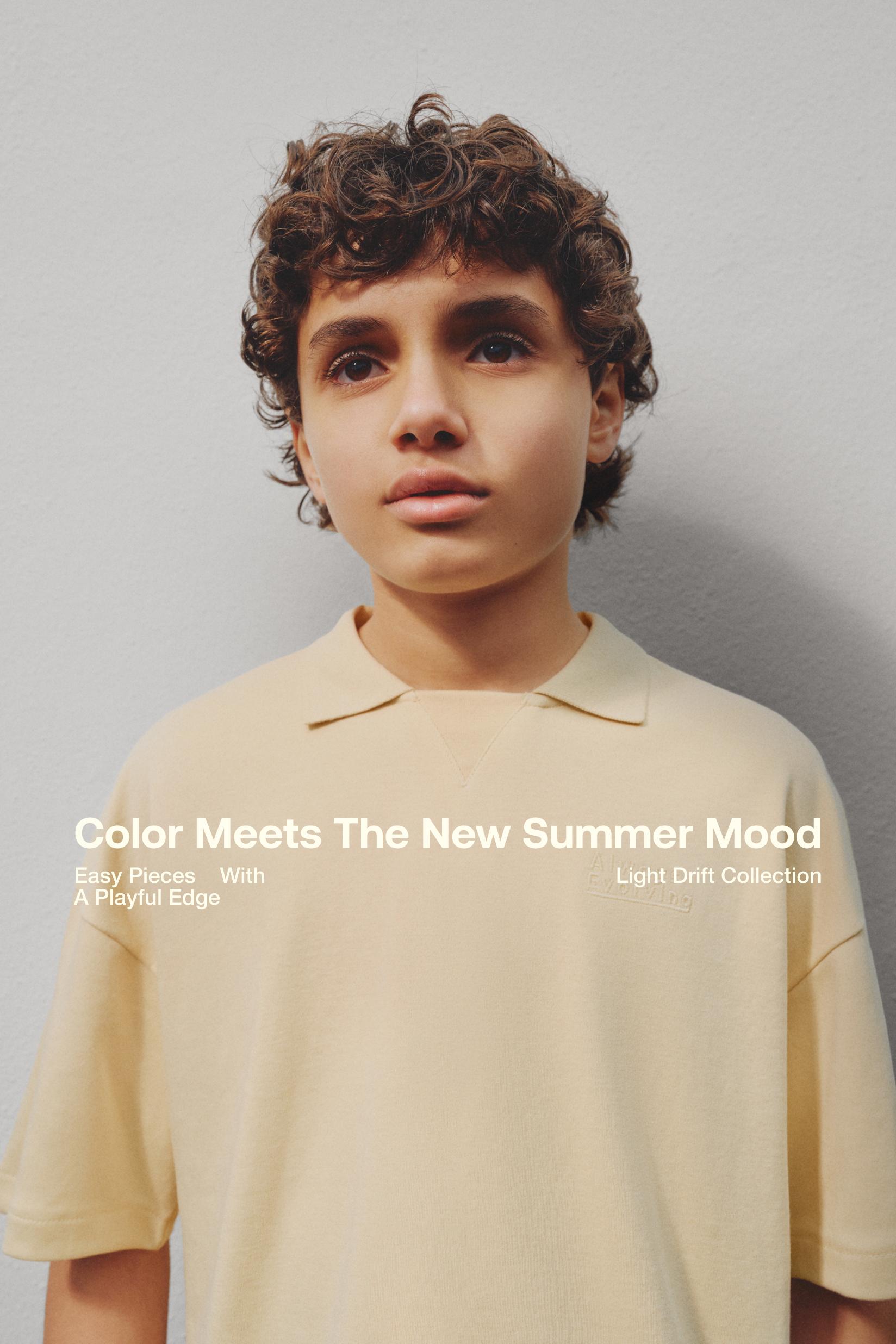 Interlock polo shirt with text — VANILLA