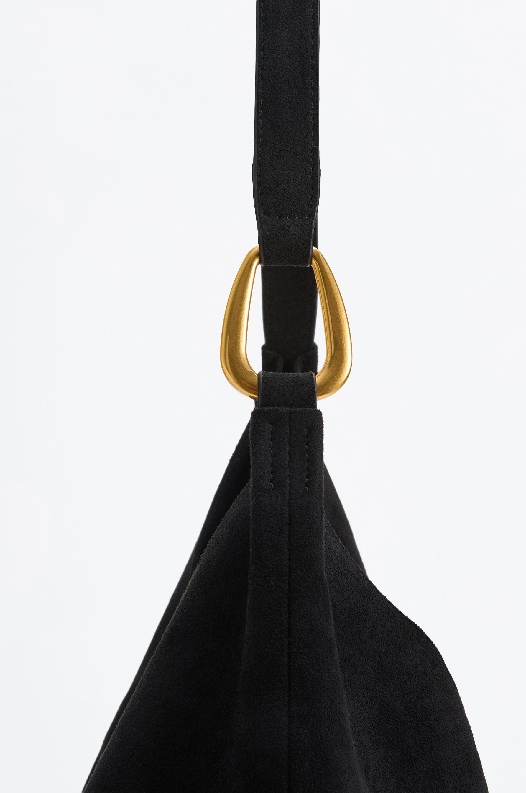 Faux suede bucket bag with ring detail — BLACK