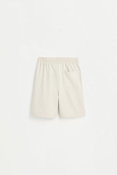 Plush Bermuda shorts with text — PALE MINK 2