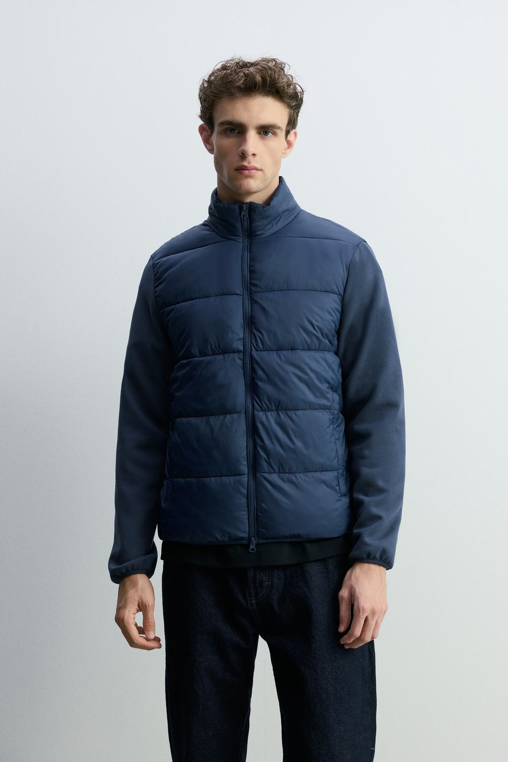 سترة مبطنة بأكمام متشابكة