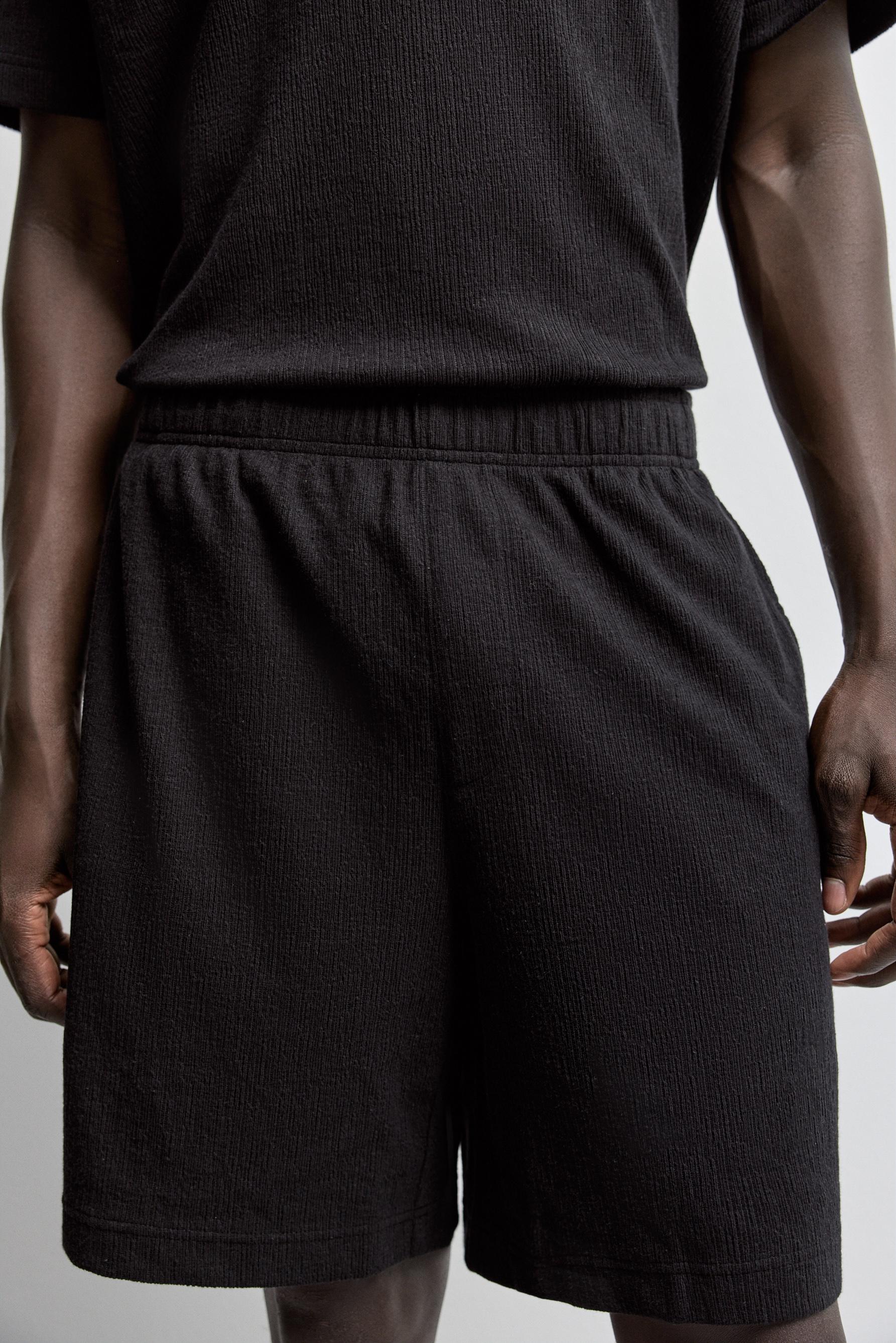 Rustic textured Bermuda shorts — BLACK