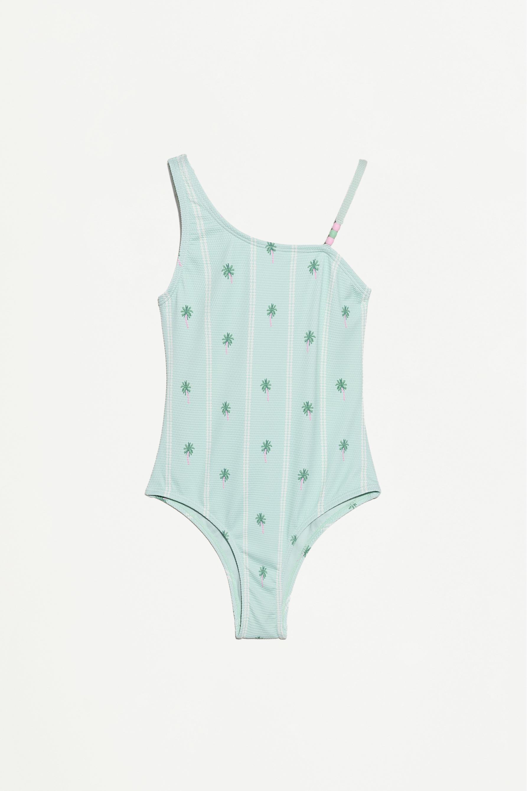 Bañador asimétrico abalorios