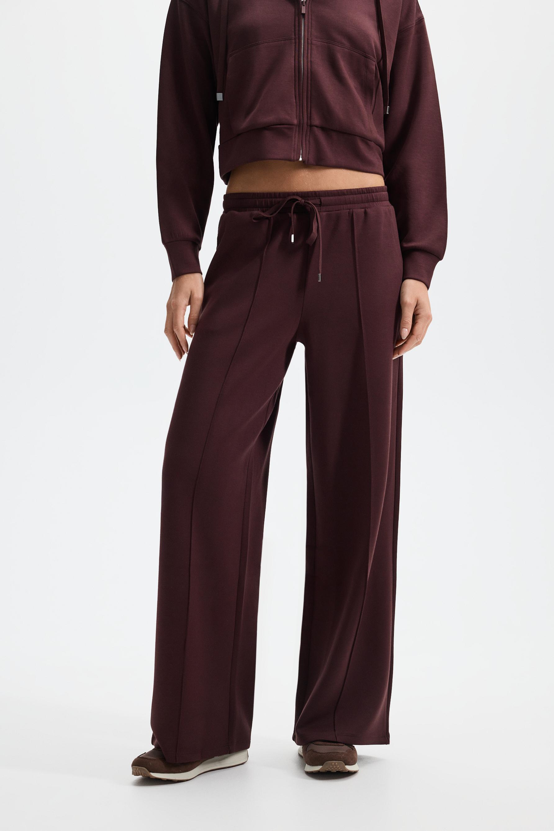Wide-leg tracksuit trousers with front seam — WINE